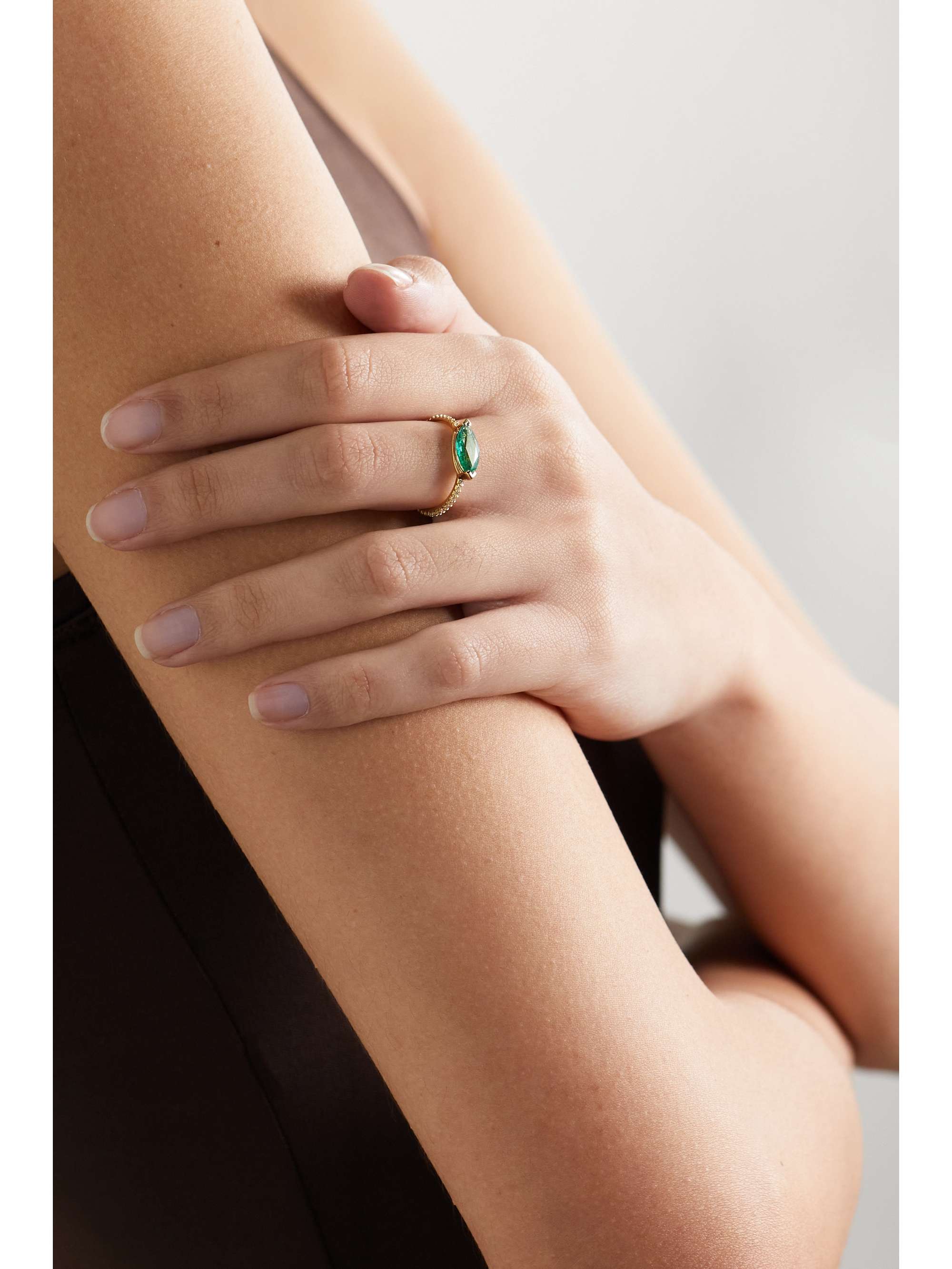 18 karat gold emerald and diamond ring