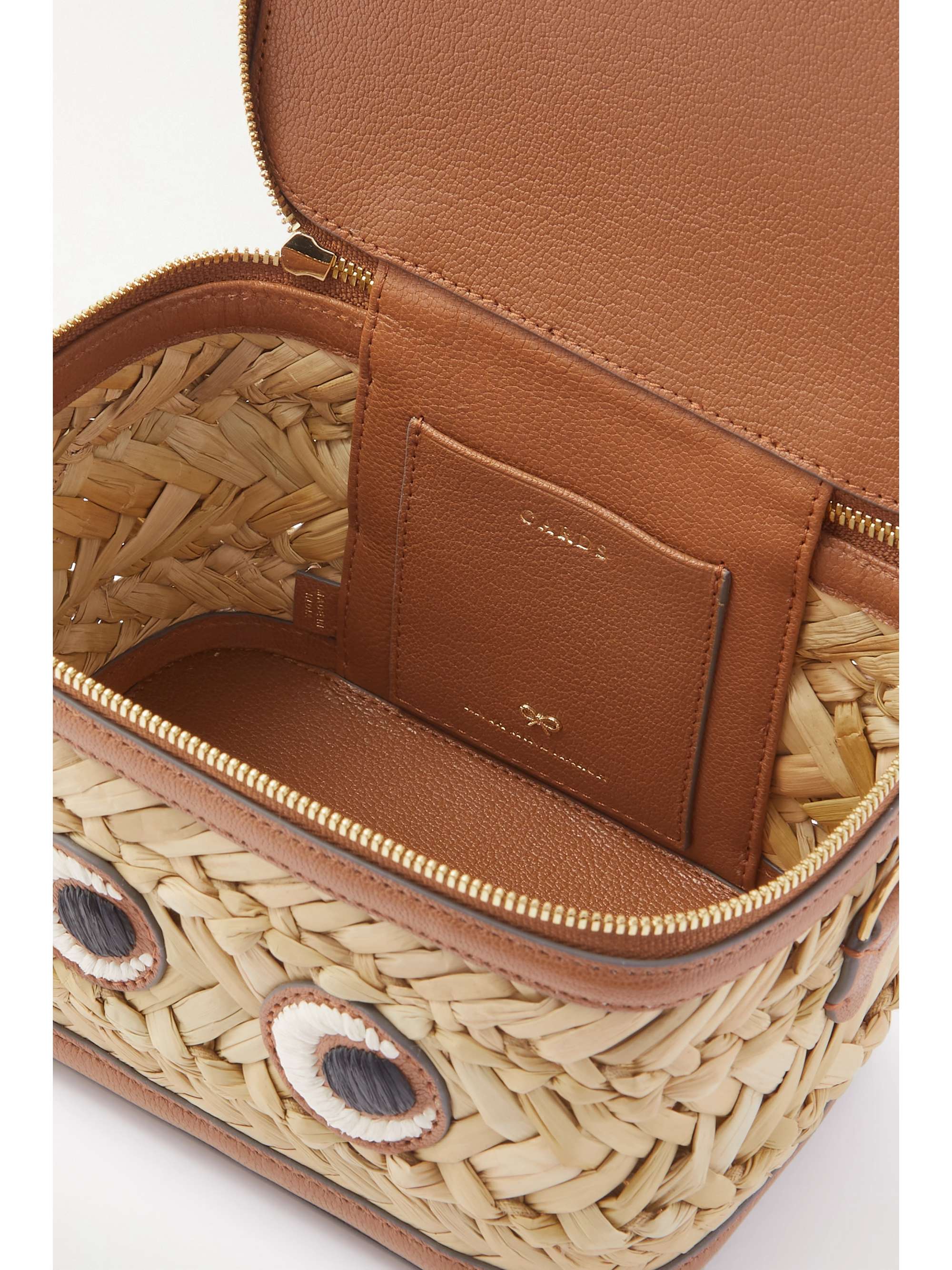 ANYA HINDMARCH Bits and Bobs Eyes leathertrimmed straw shoulder bag NETAPORTER