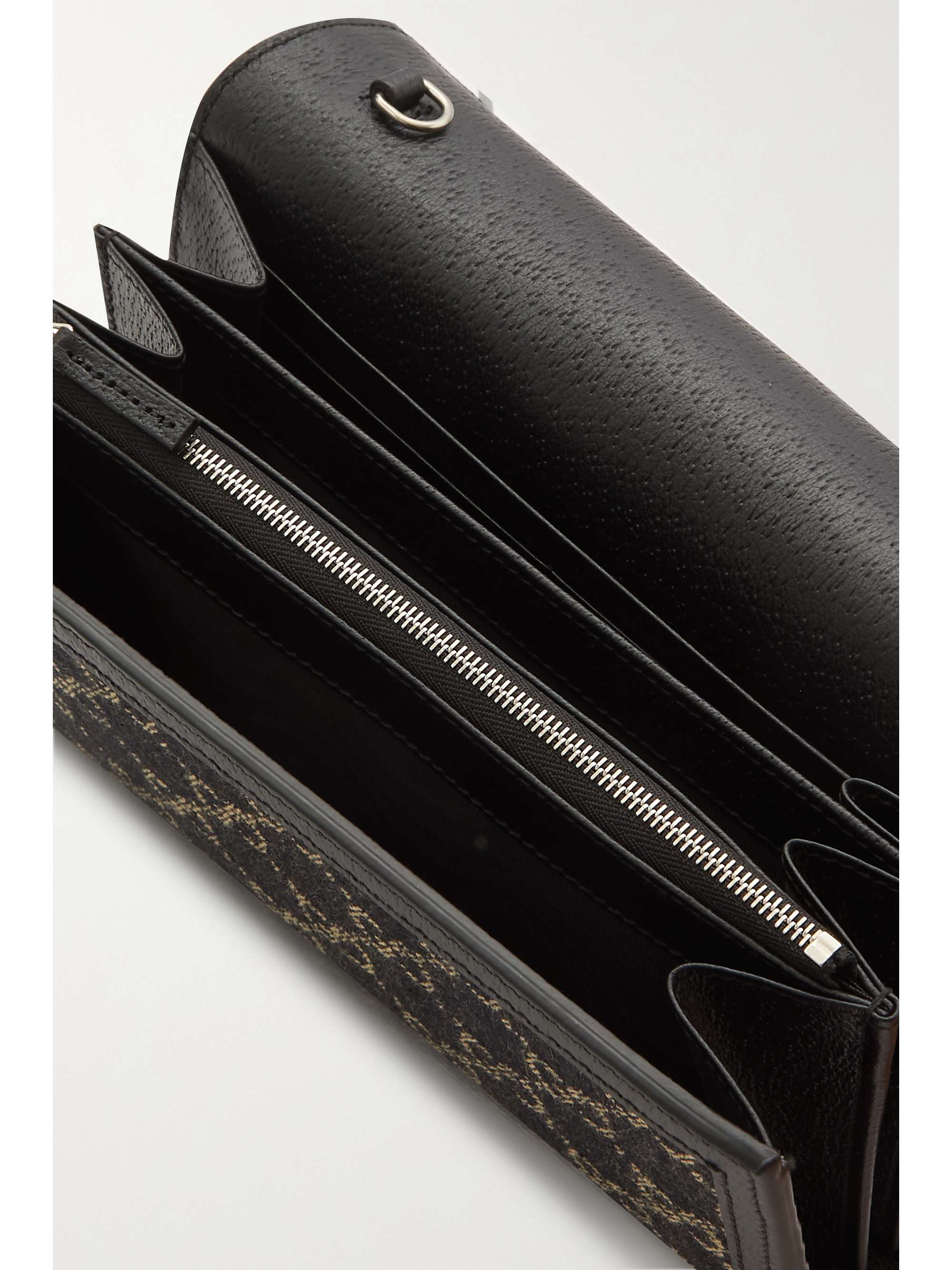 Black Dionysus leather-trimmed denim 