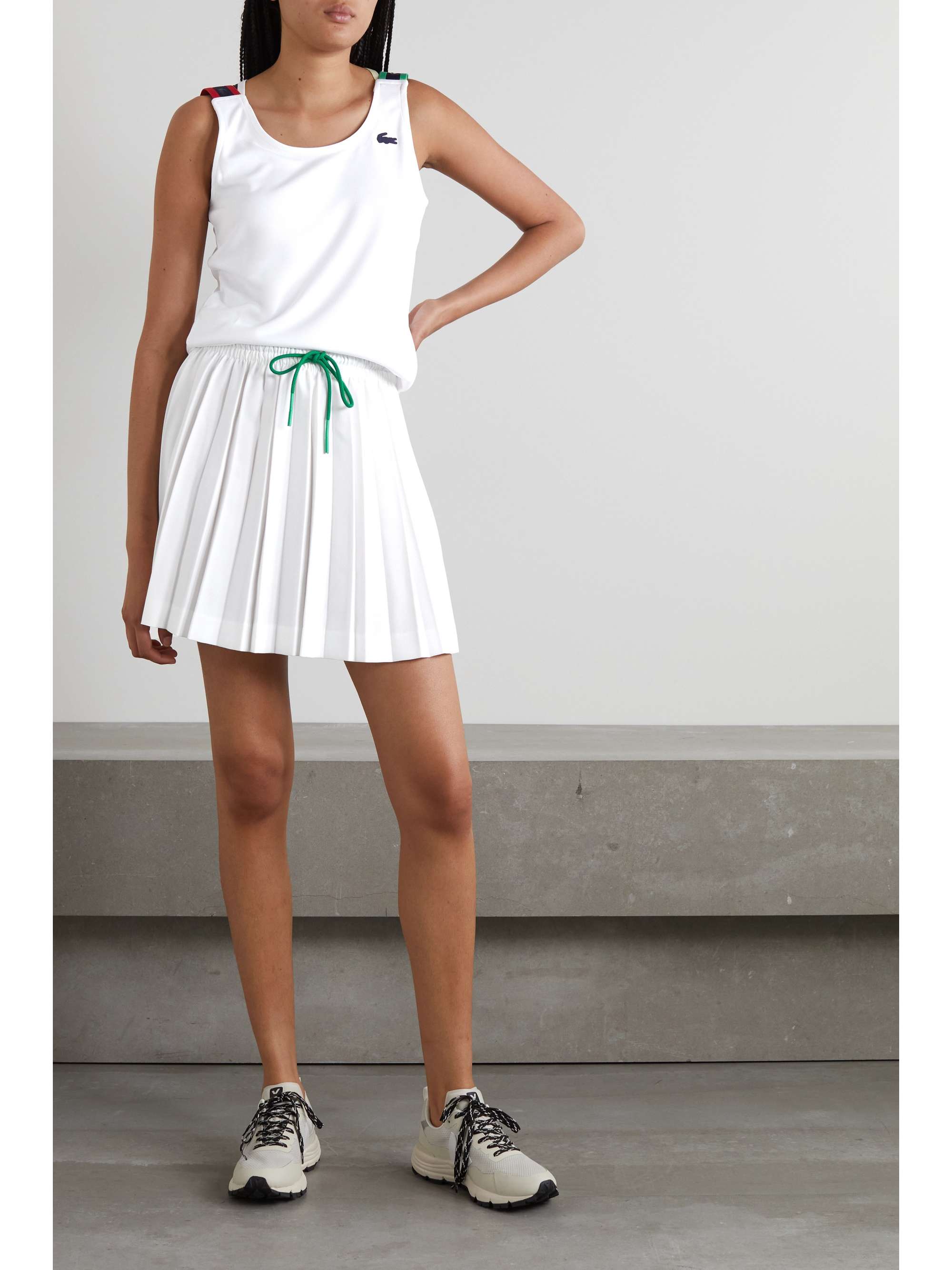 LACOSTE Appliquéd pleated piqué tennis skirt | NET-A-PORTER