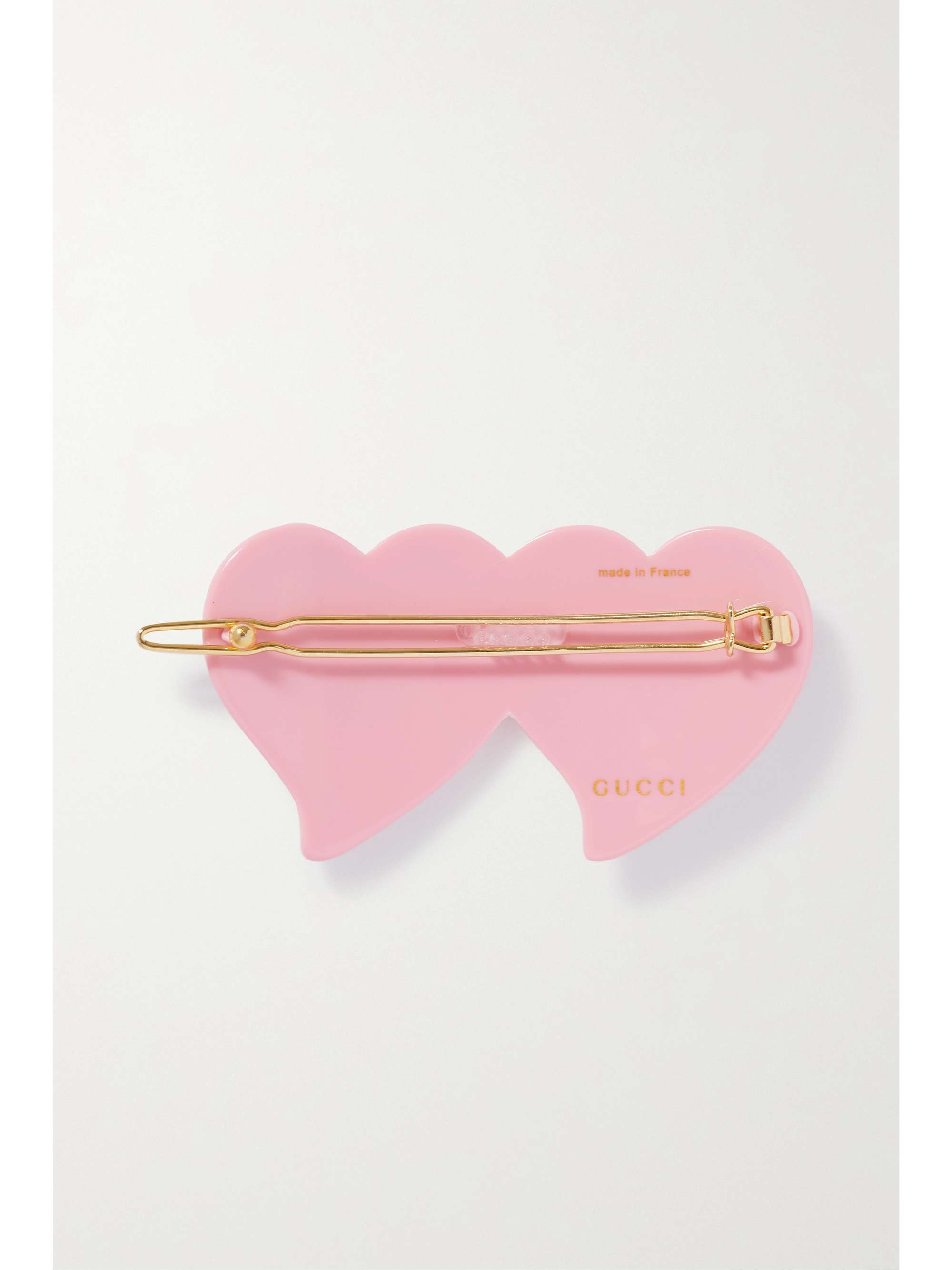 GUCCI Haarspange aus Harz mit goldfarbenen Details und Kristallen