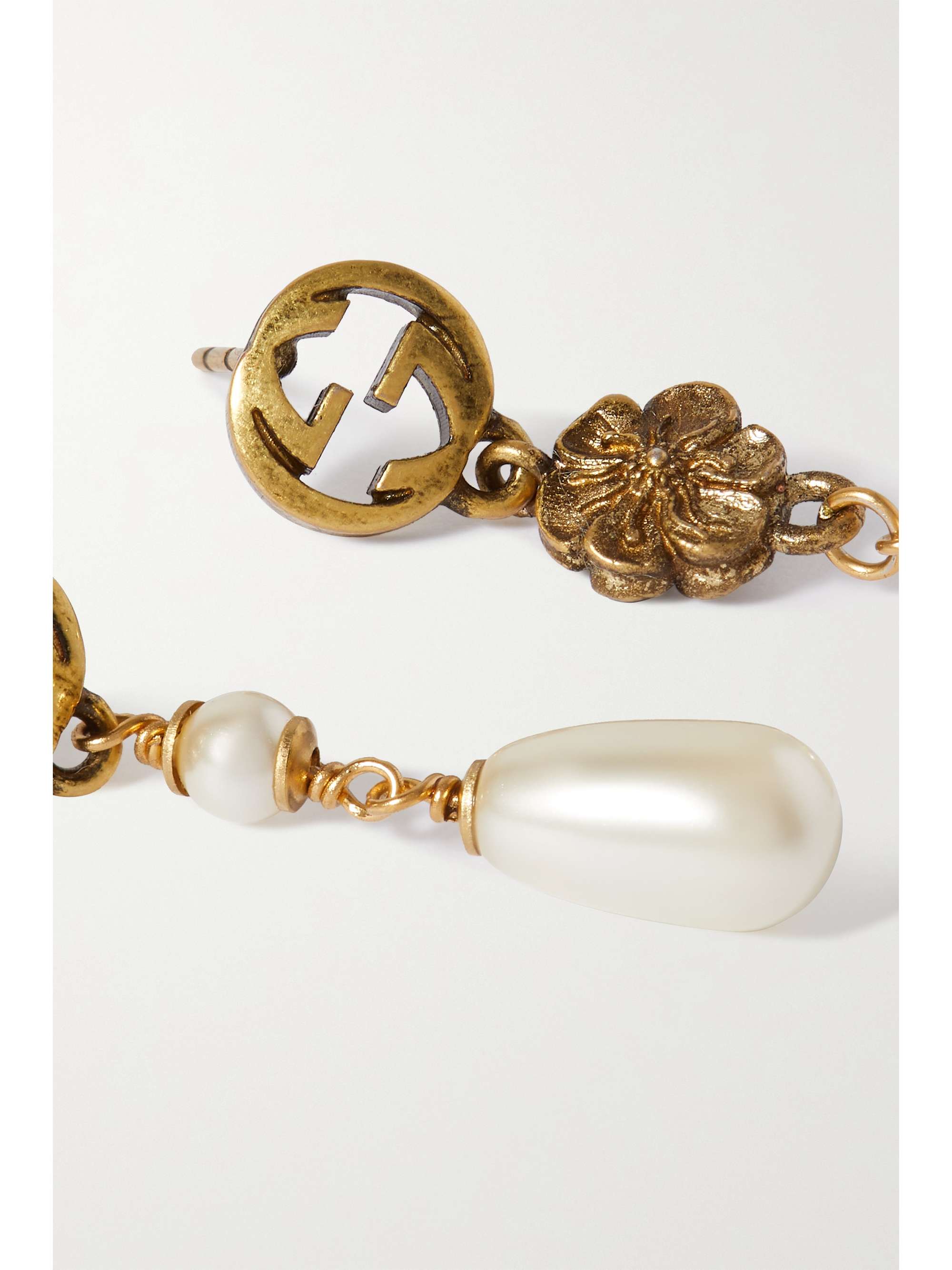 GG earrings with faux pearls in gold - Gucci