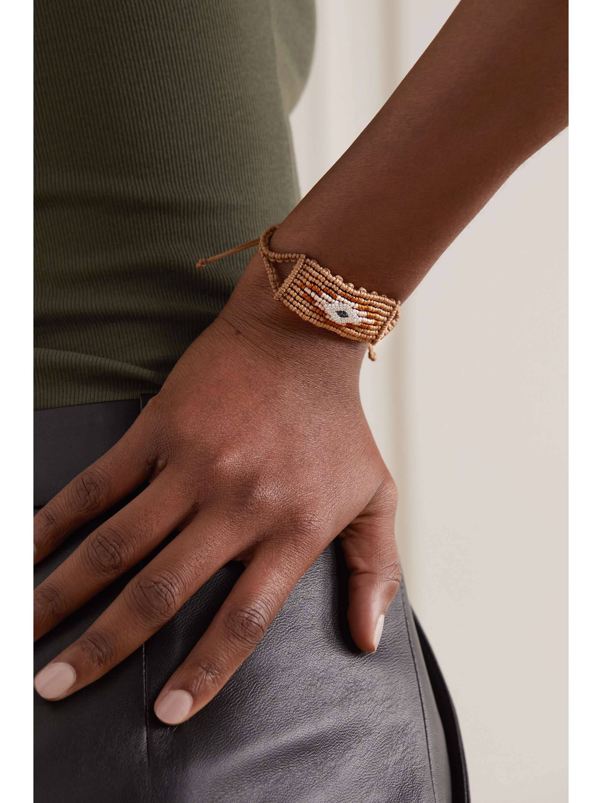 DIANE KORDAS Evil Eye woven cord, 14-karat white gold, diamond and sapphire bracelet