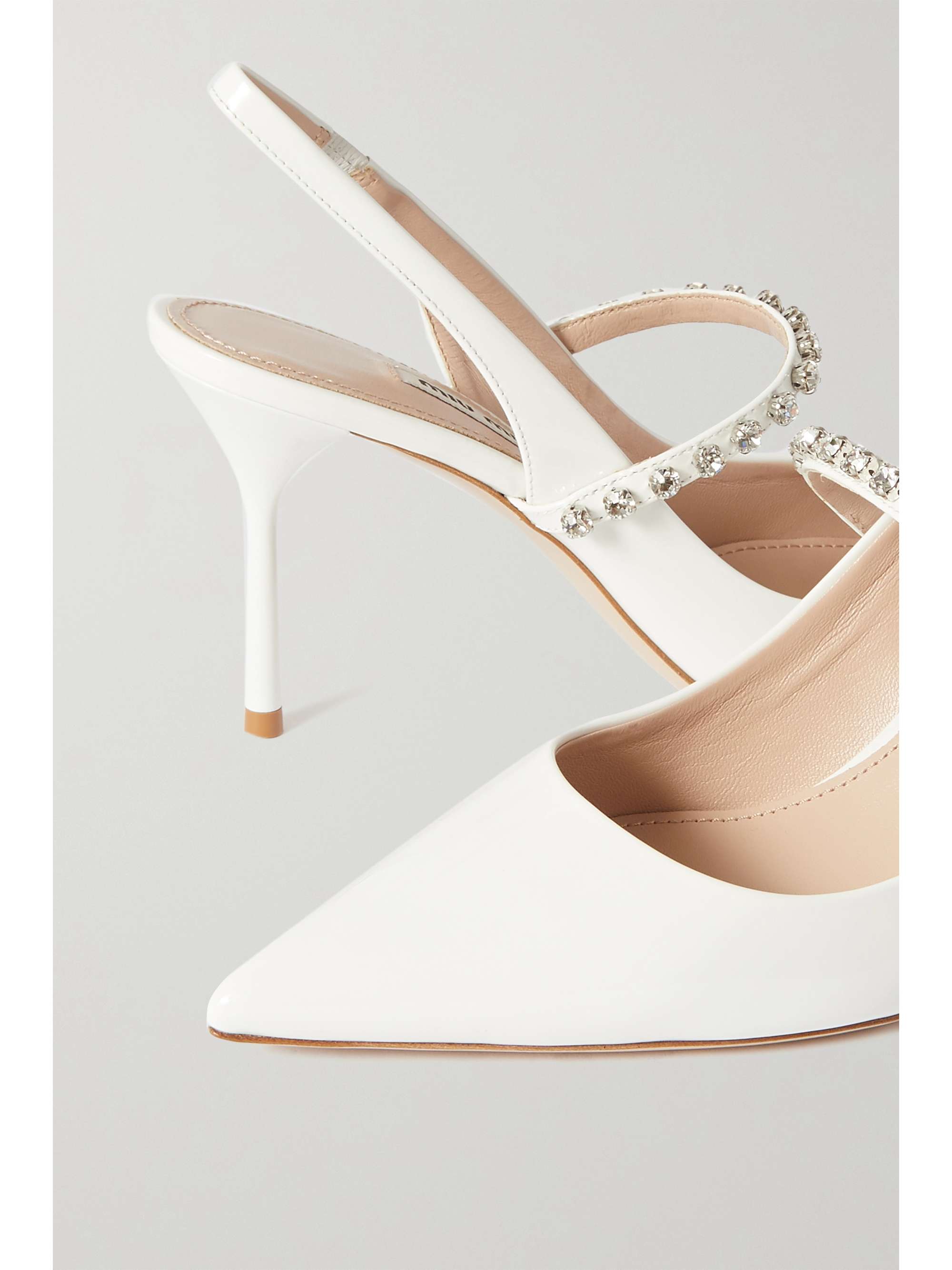 white leather slingbacks