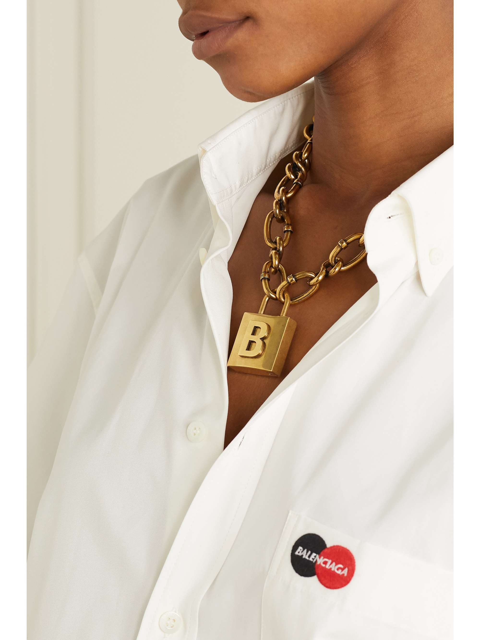 BALENCIAGA Lock embossed gold-tone necklace