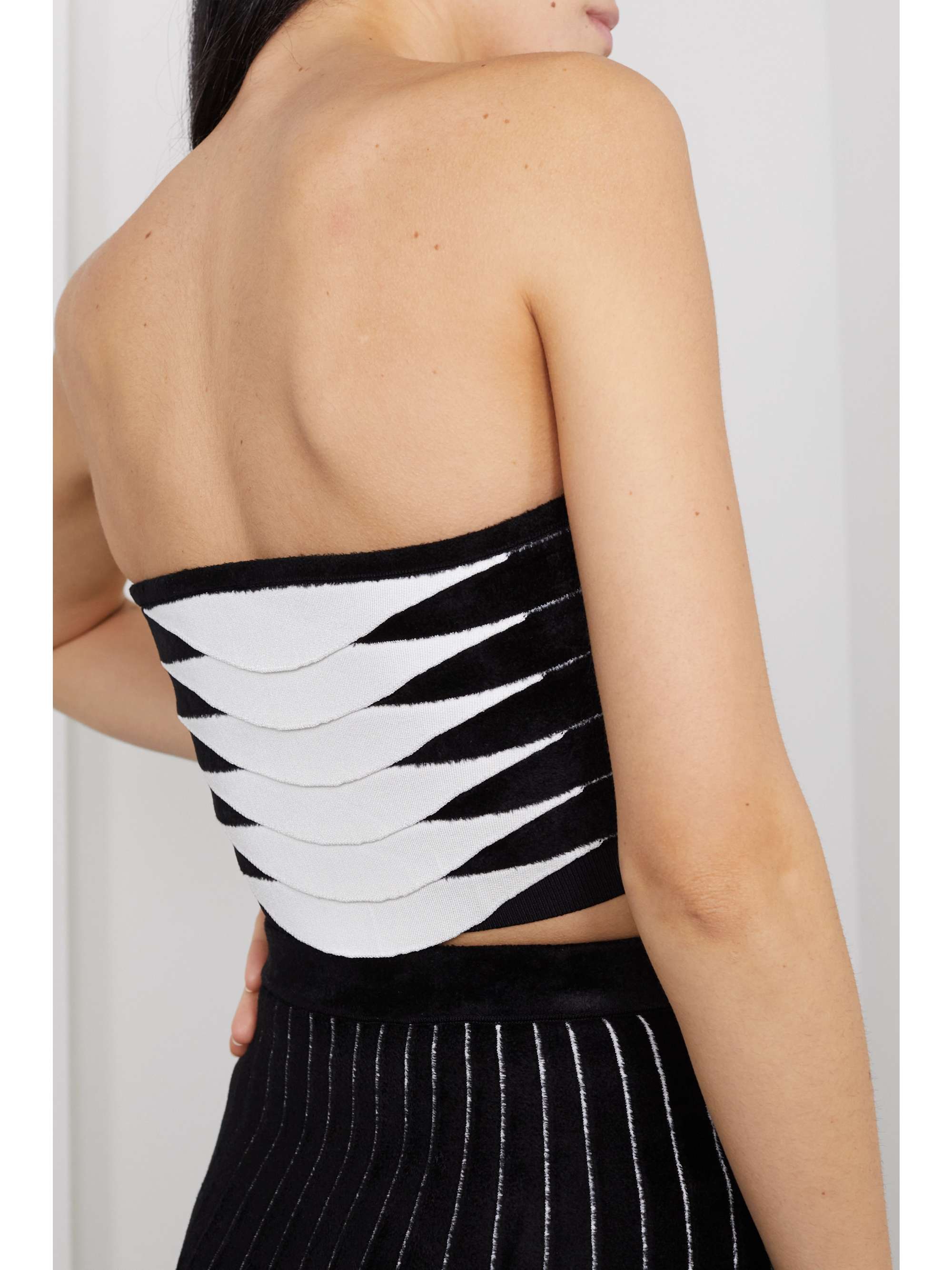 ALAÏA Strapless layered bouclé and stretch-knit top