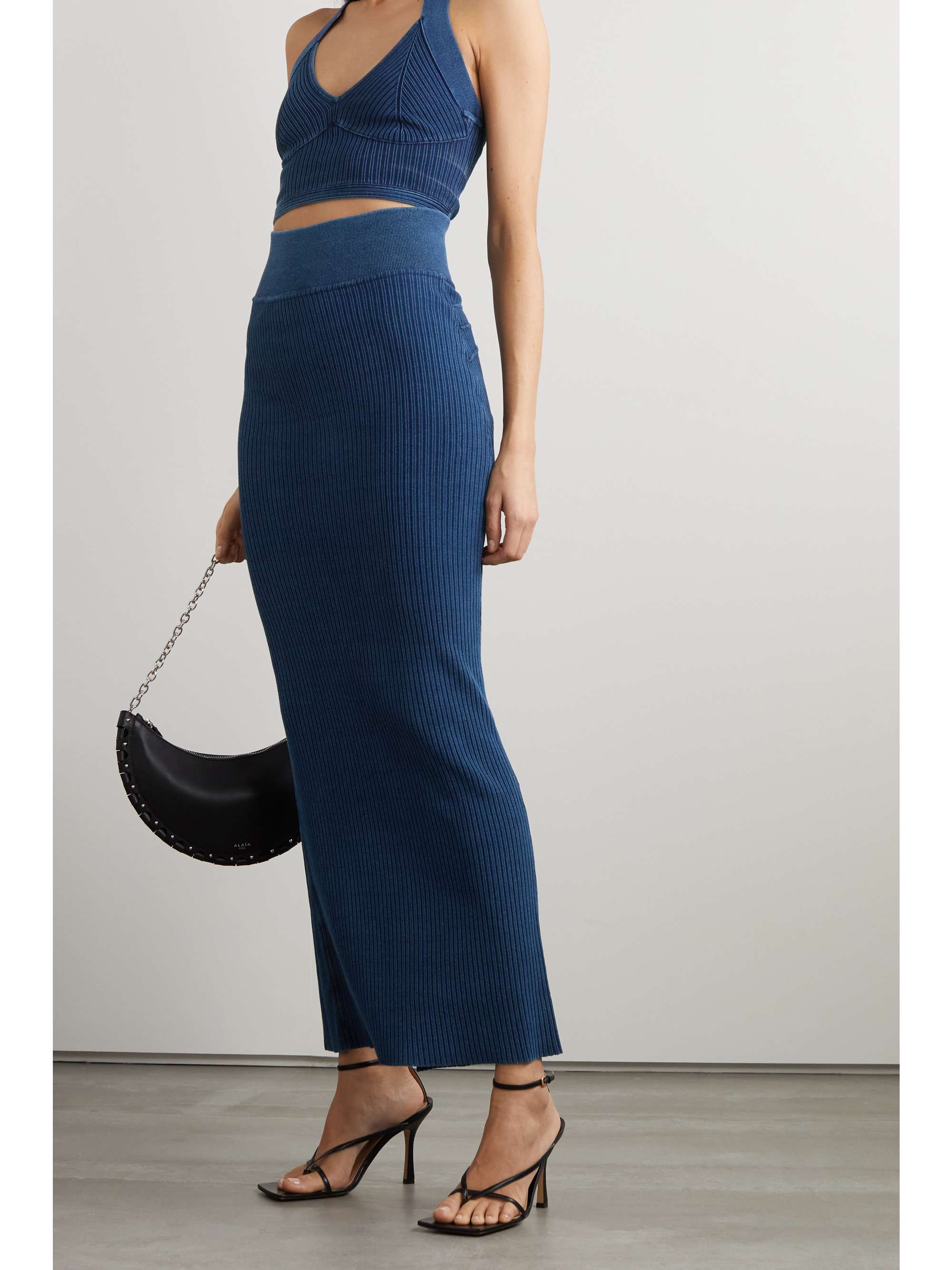 ALAÏA Ribbed cotton-blend maxi skirt