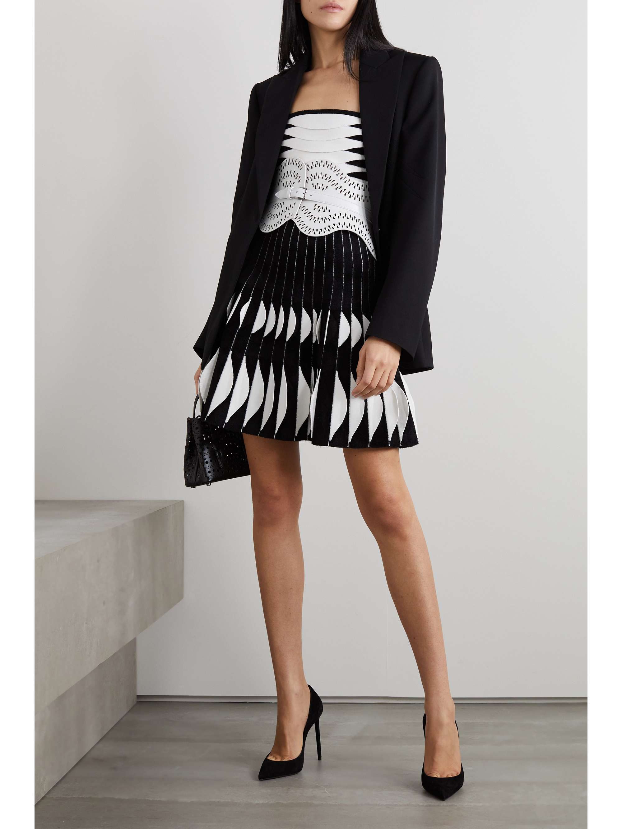 ALAÏA Pleated velour and stretch-knit mini skirt