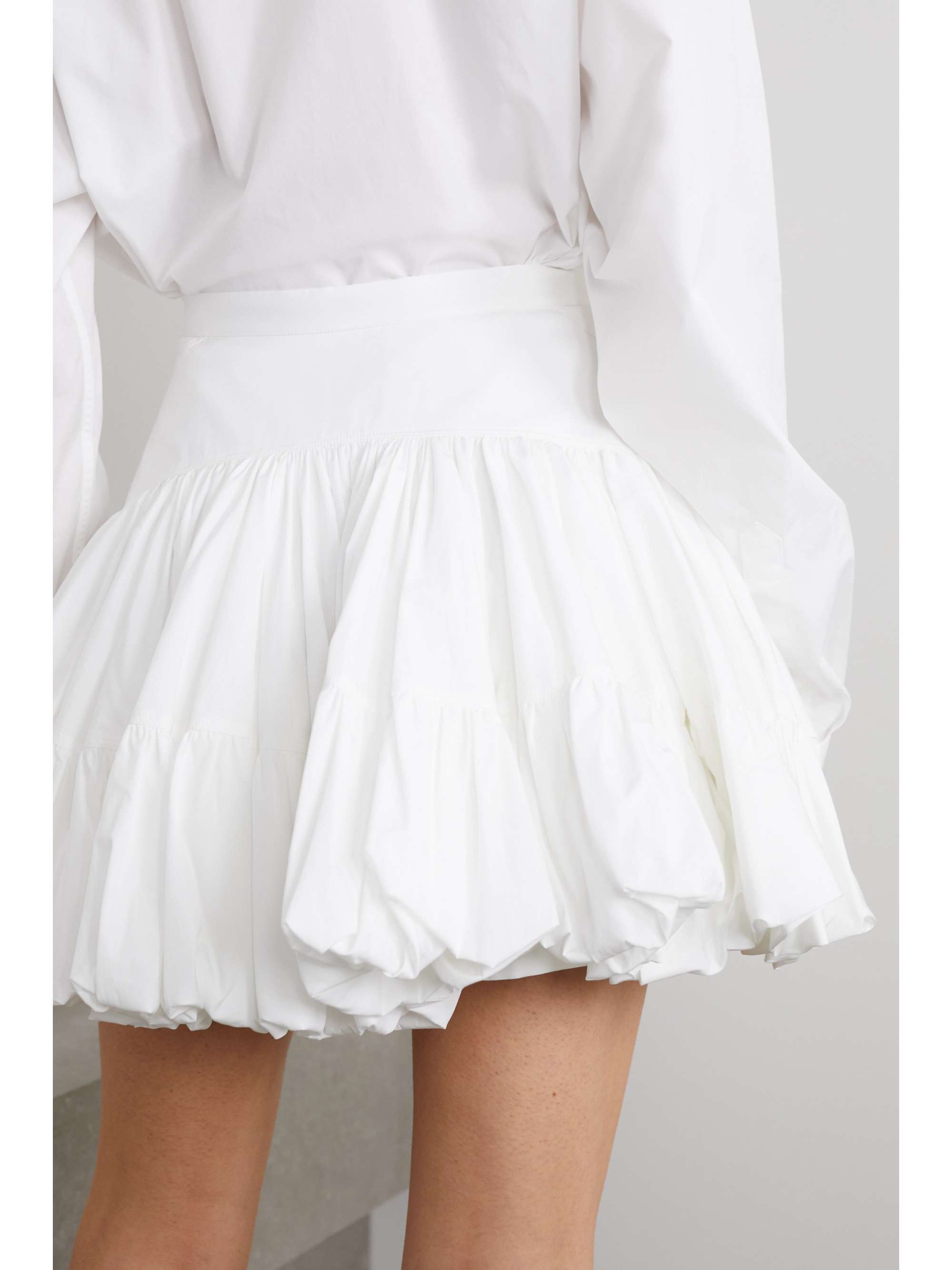 ALAÏA Gathered cotton-poplin mini skirt