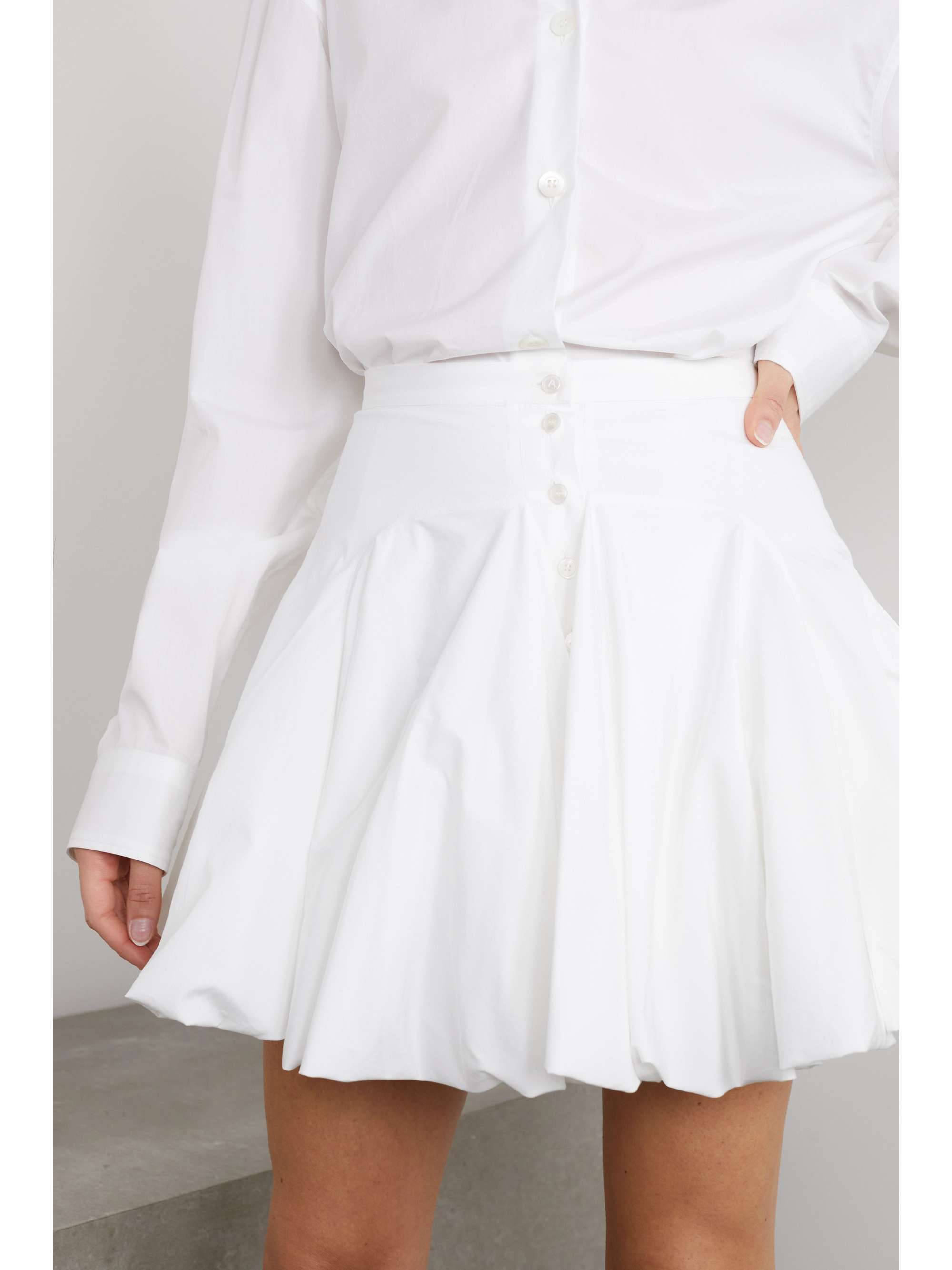 ALAÏA Gathered cotton-poplin mini skirt