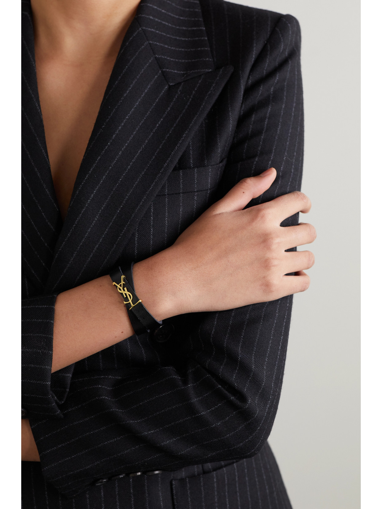 Shop Saint Laurent Opyum Leather And Gold-tone Bracelet In Black