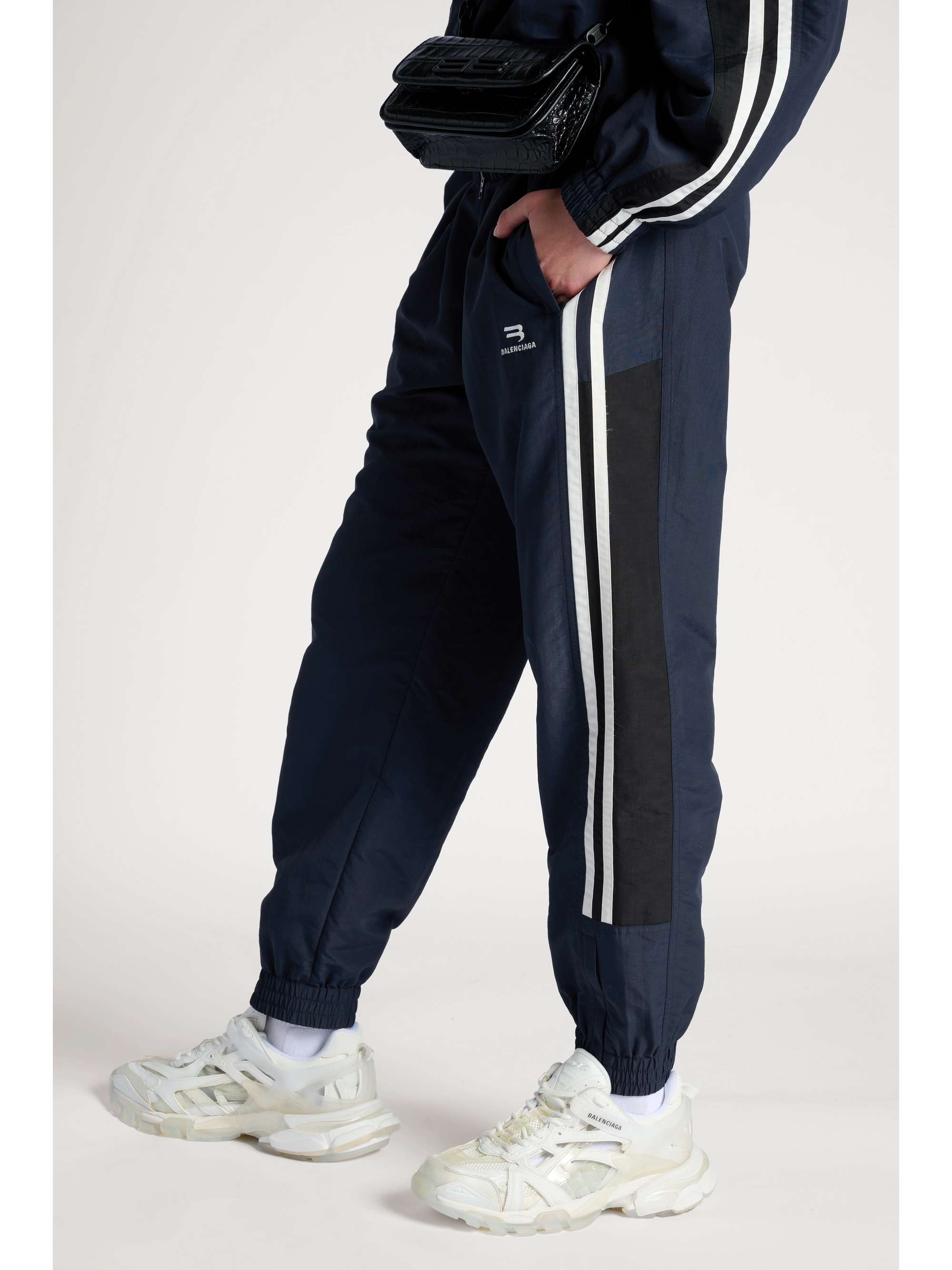 BALENCIAGA Striped shell track pants | NET-A-PORTER