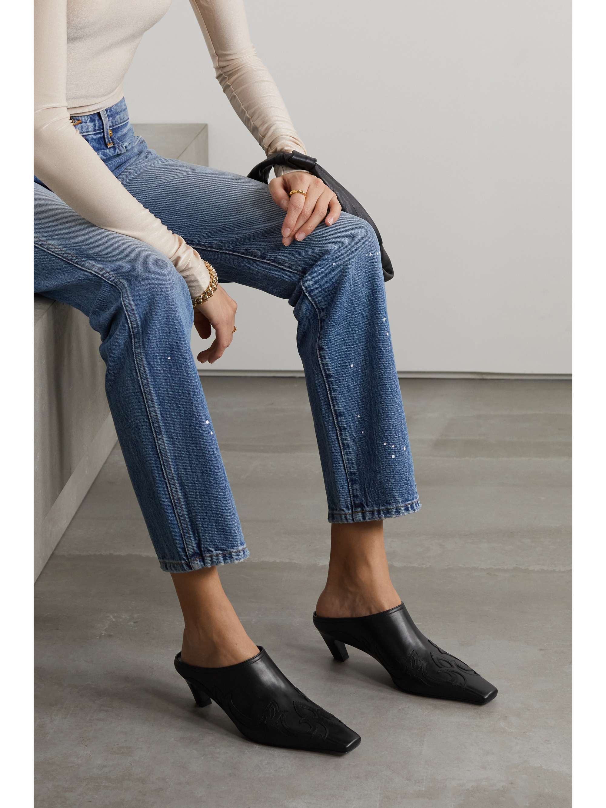 KHAITE Madison appliquéd leather mules | NET-A-PORTER