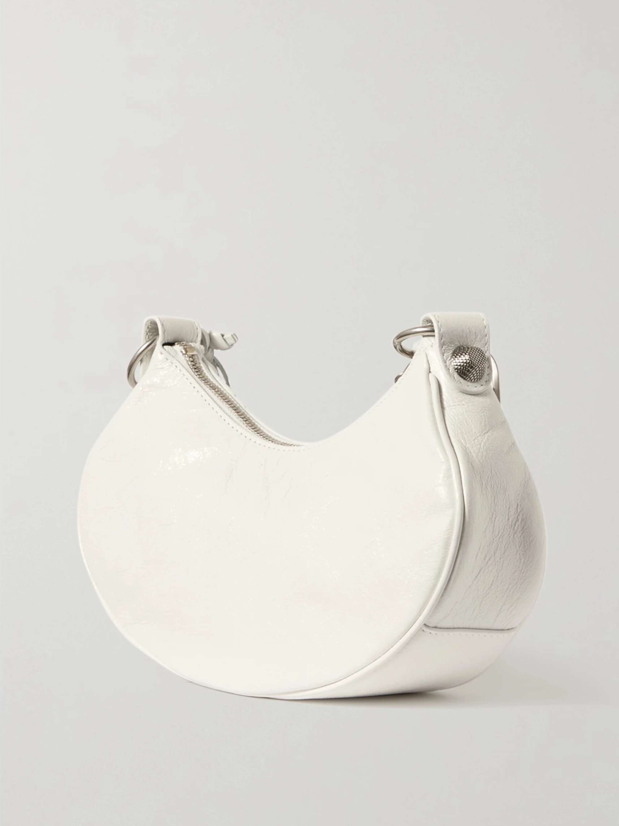 BALENCIAGA Le Cagole XS studded crinkled-leather shoulder bag