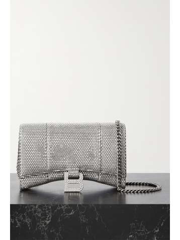 Hourglass crystal-embellished suede shoulder bag by Net-a-porter, available on net-a-porter.com for $3577 Rihanna Bags SIMILAR PRODUCT