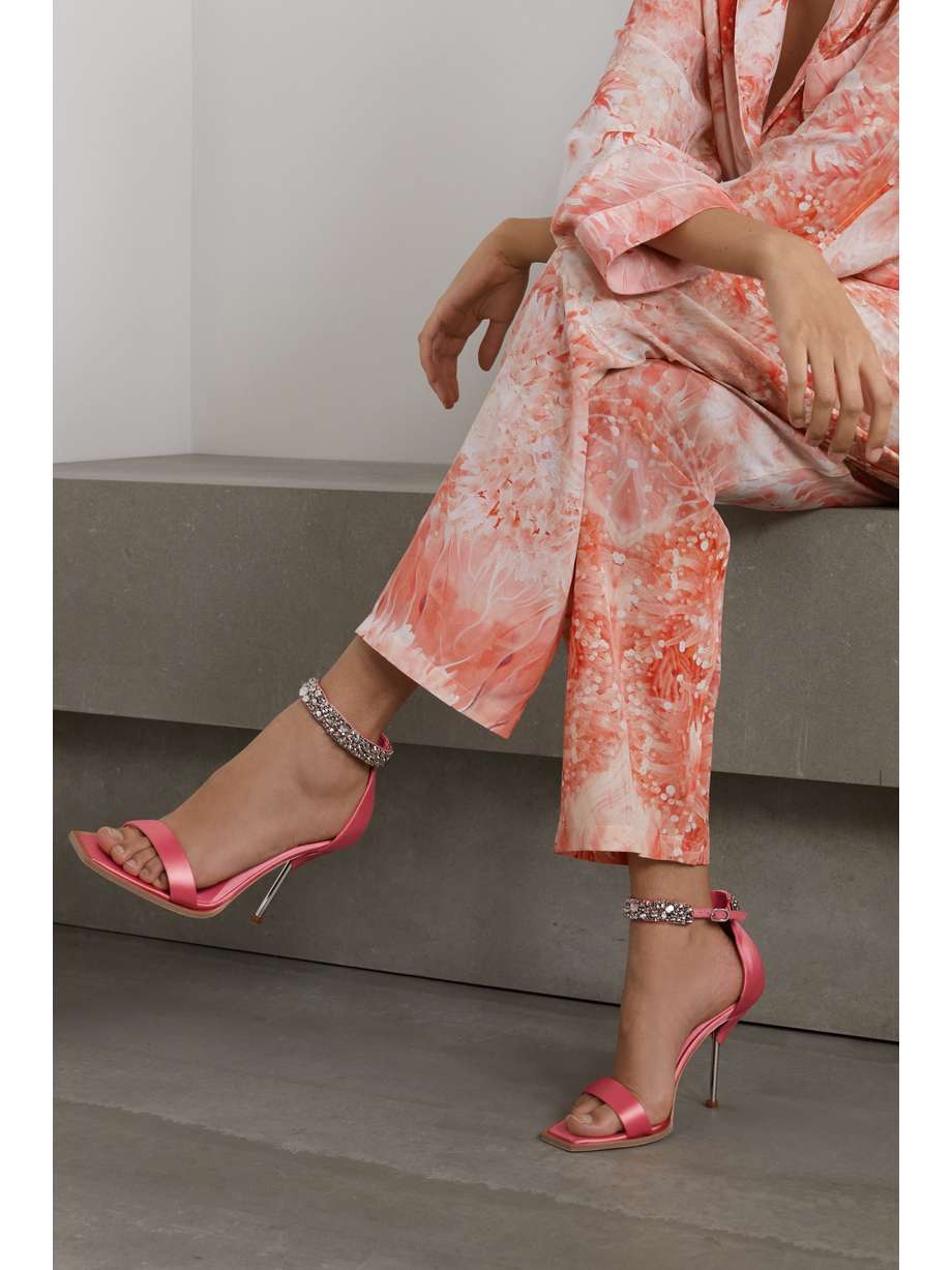 Alexander McQueen's sandals are embellished with scores of faceted crystals at the ankle straps, so be sure to show them off with high hemlines. They're crafted from smooth coral satin and have mirrored pin heels.