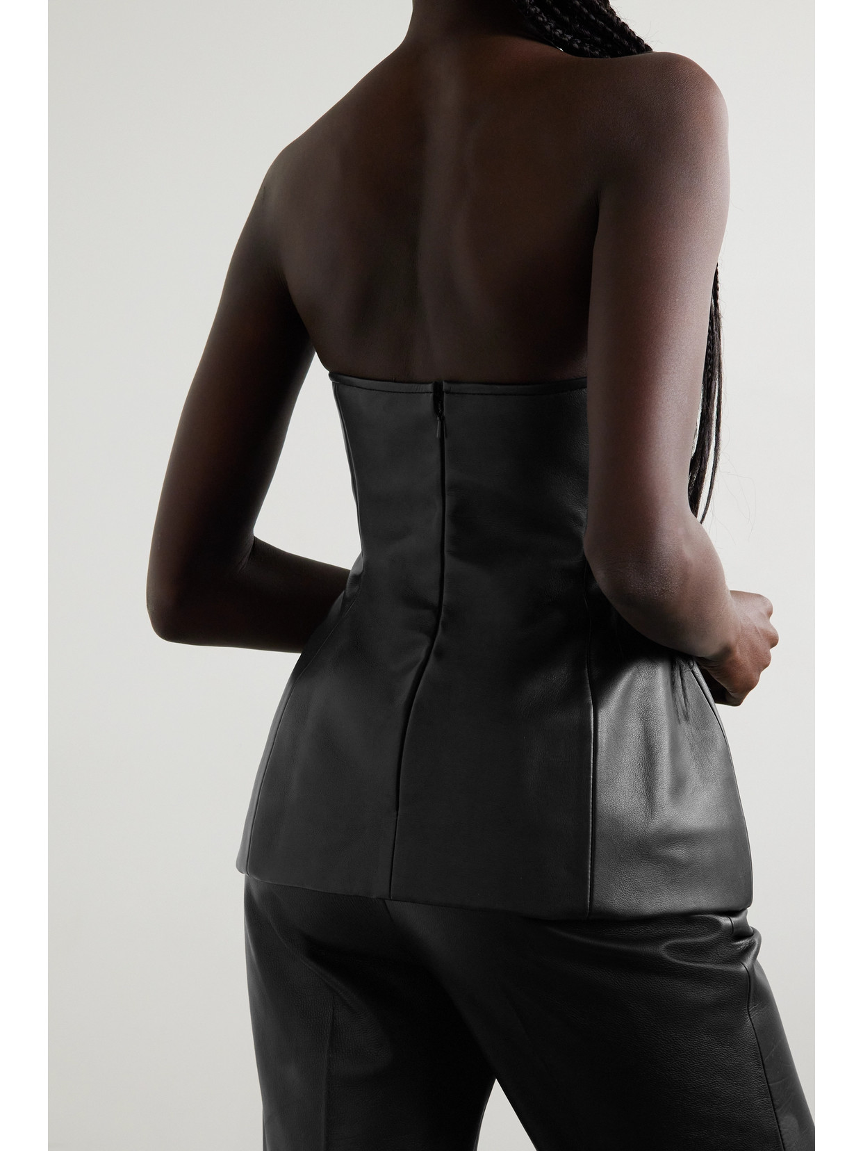Khaite Blanche Strapless Leather Peplum Top In Black