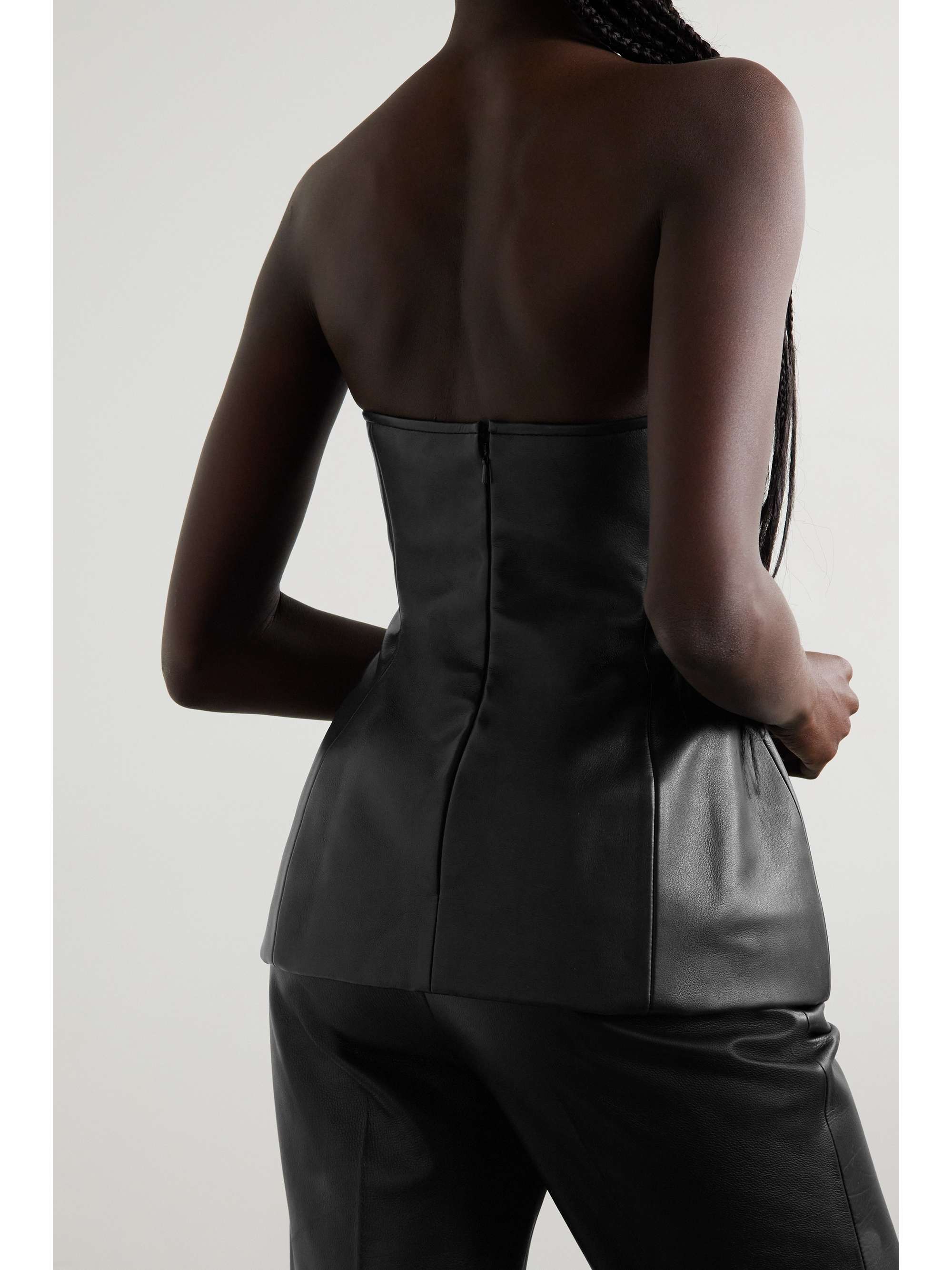 KHAITE Blanche strapless leather peplum top