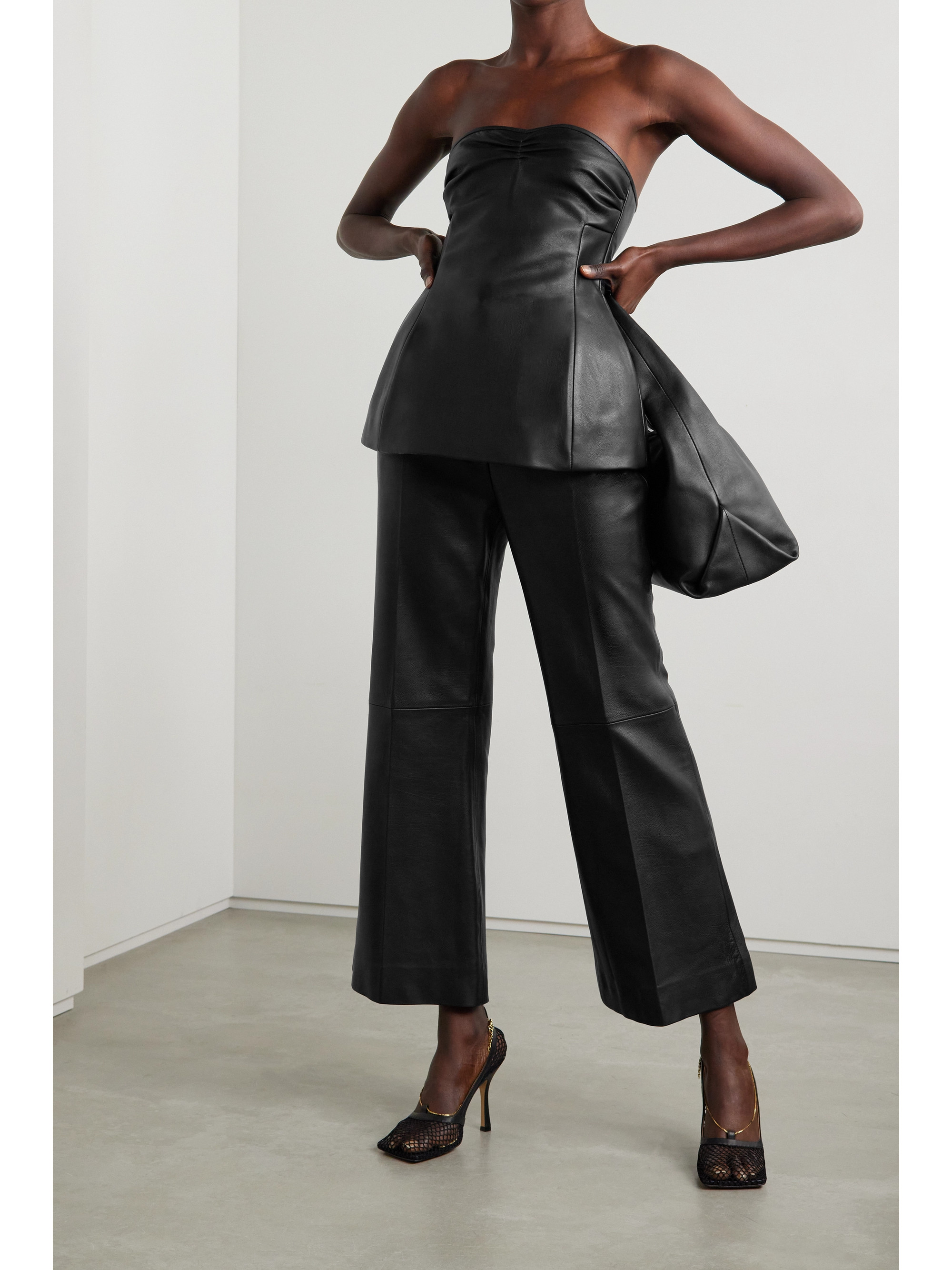 KHAITE Blanche strapless leather peplum top