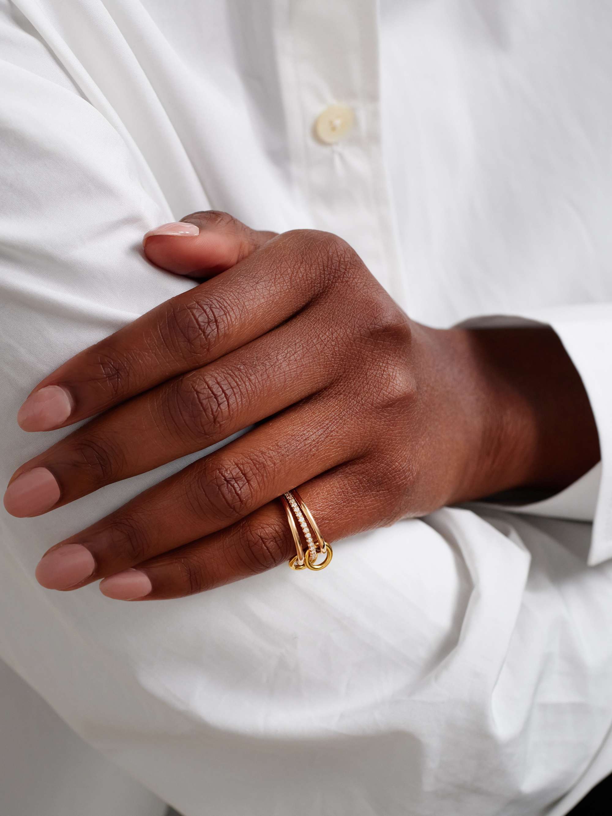 SPINELLI KILCOLLIN Sonny set of three 18-karat yellow and rose gold and diamond rings