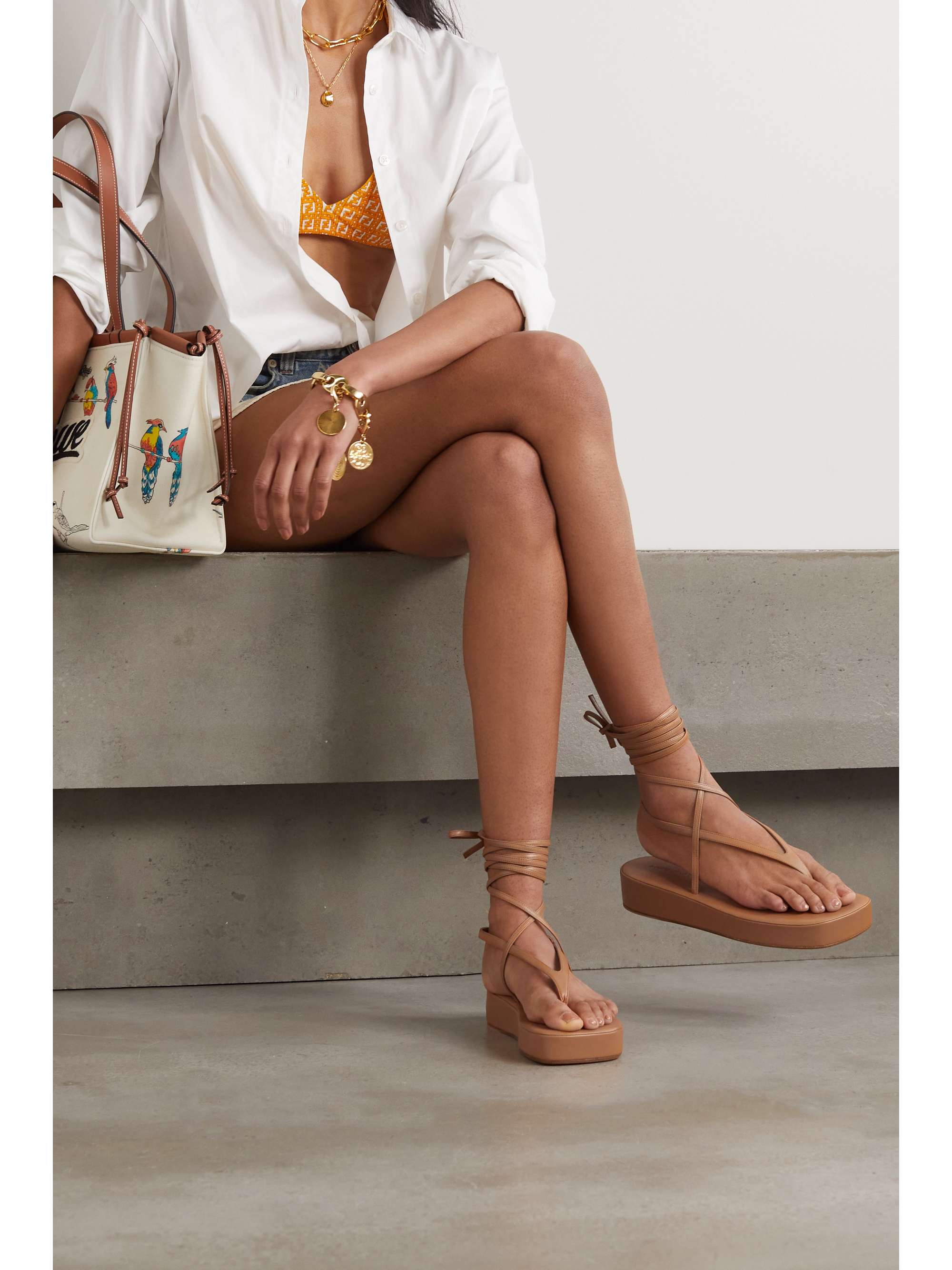 amina muaddi platform