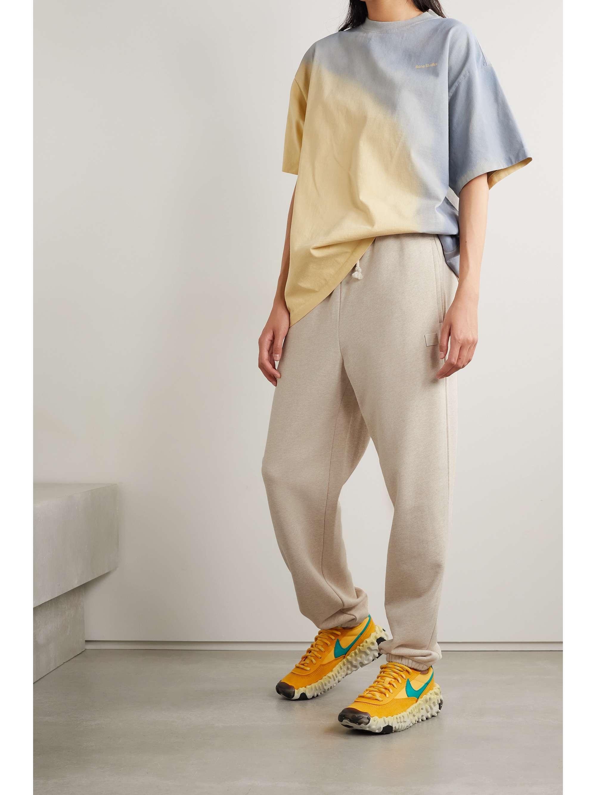 Appliquéd cotton-jersey track pants