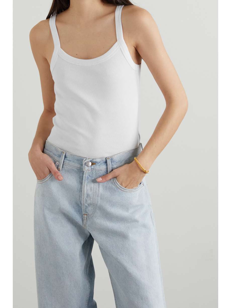 London-based brand Ninety Percent creates elevated basics with conscious values at their core. This ribbed tank is made from organic cotton with a touch of stretch and has a slim silhouette. Whether layered with seasonal knitwear or styled under a wrap dress for the office, it'll form the backbone of your wardrobe for years to come.