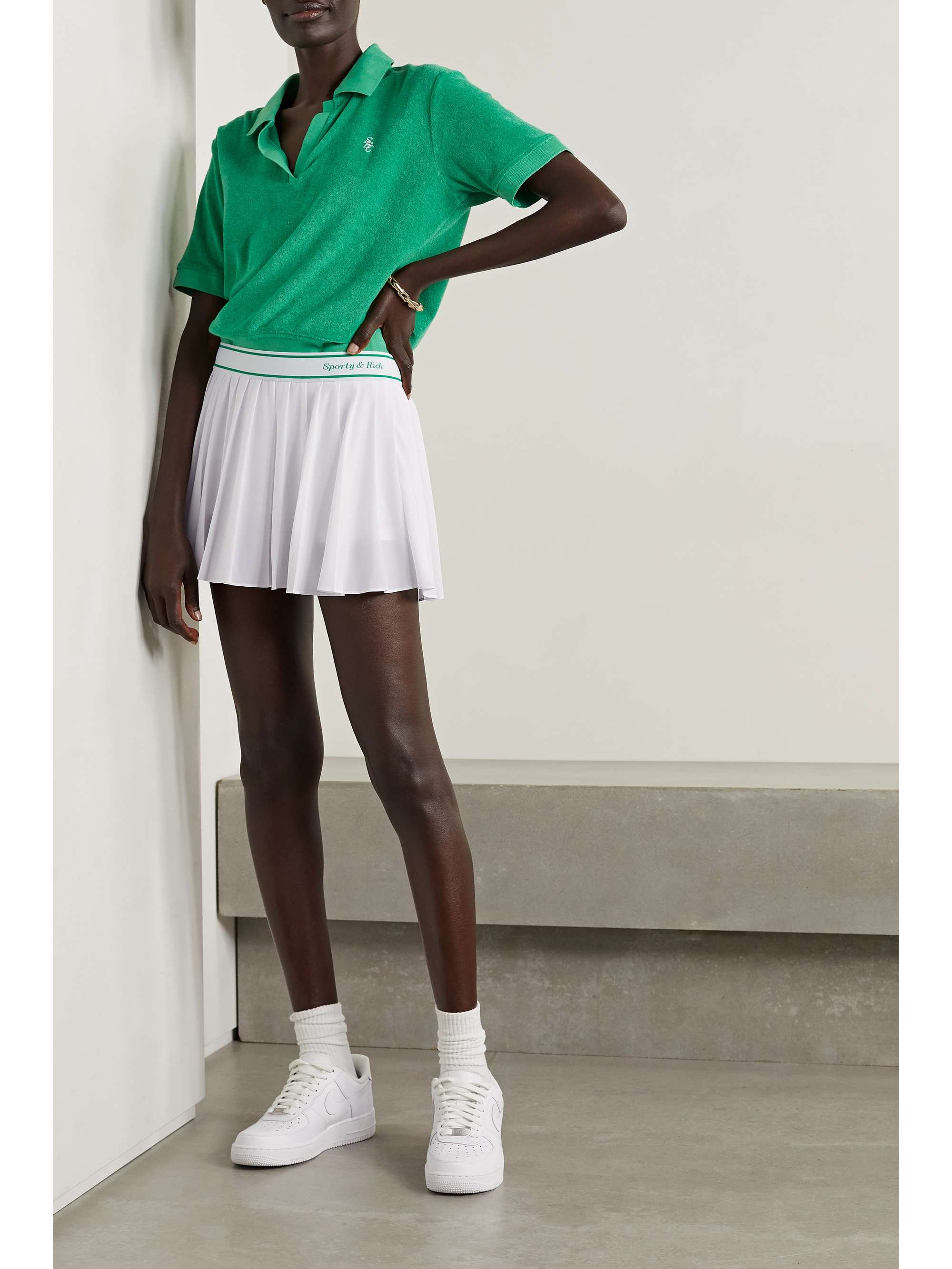 SPORTY & RICH Logo-print flared stretch-jersey tennis skirt