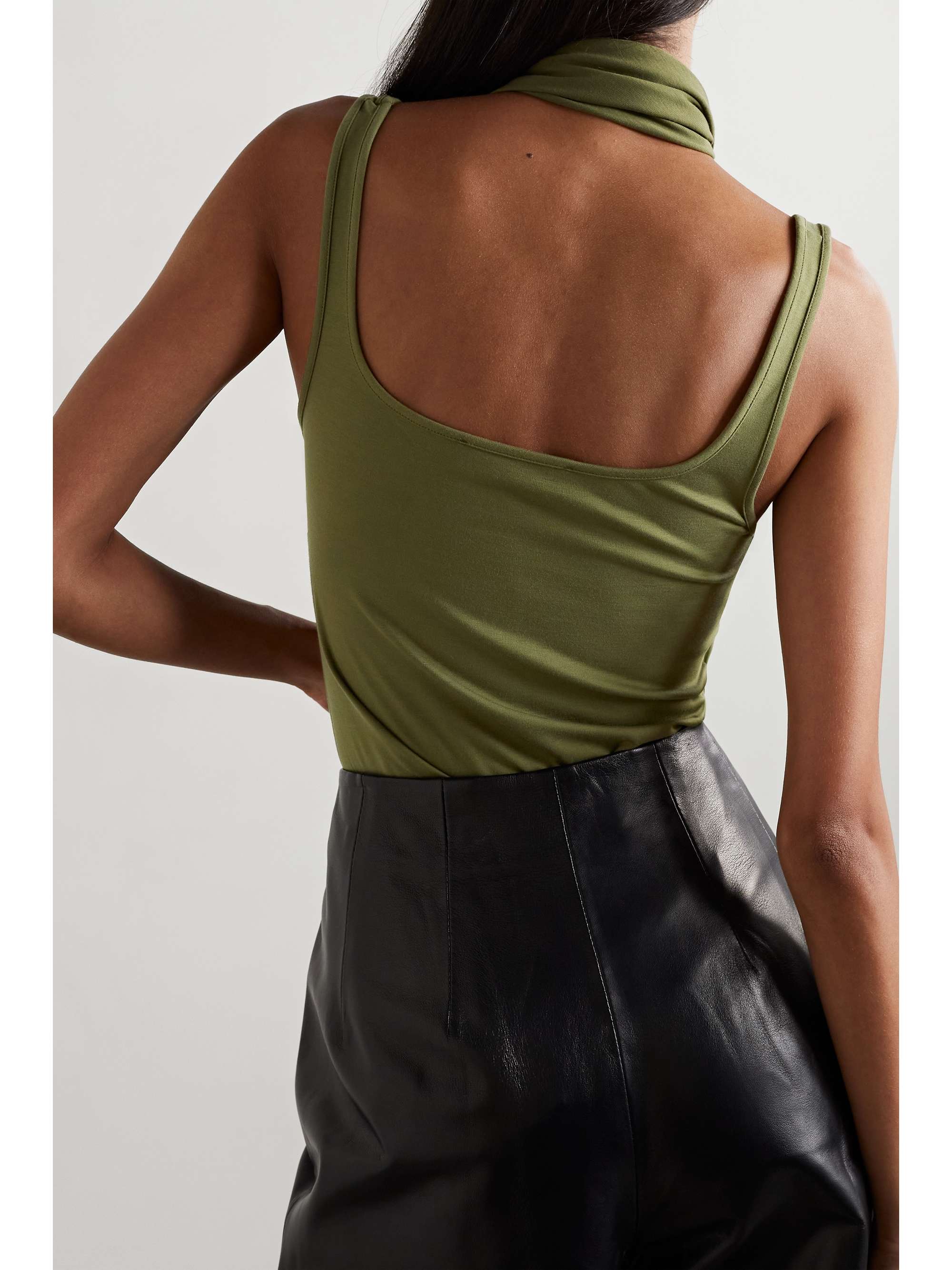 THE ATTICO Yuri asymmetric cutout stretch-jersey halterneck top
