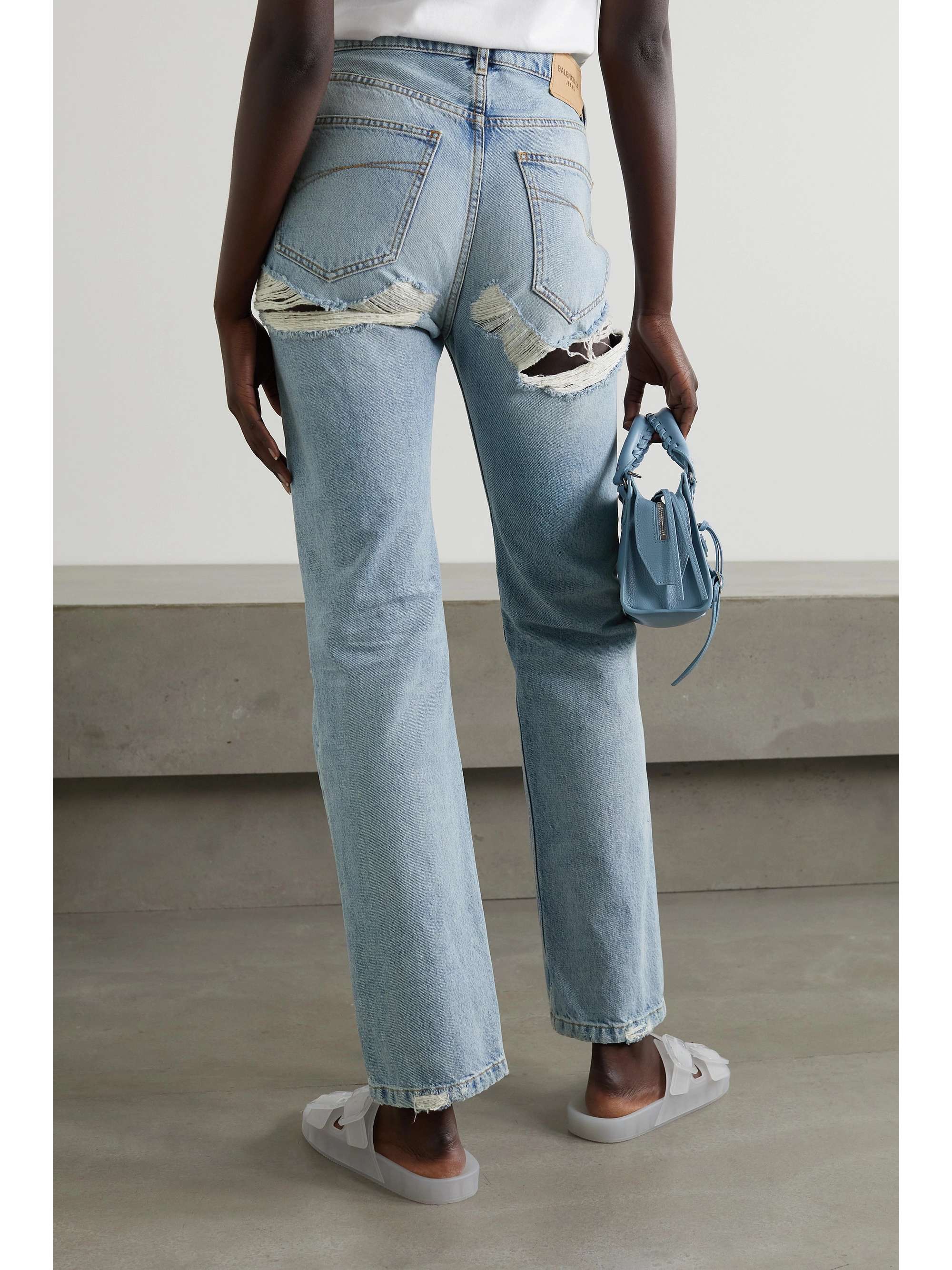 BALENCIAGA Distressed midrise straightleg jeans NETAPORTER