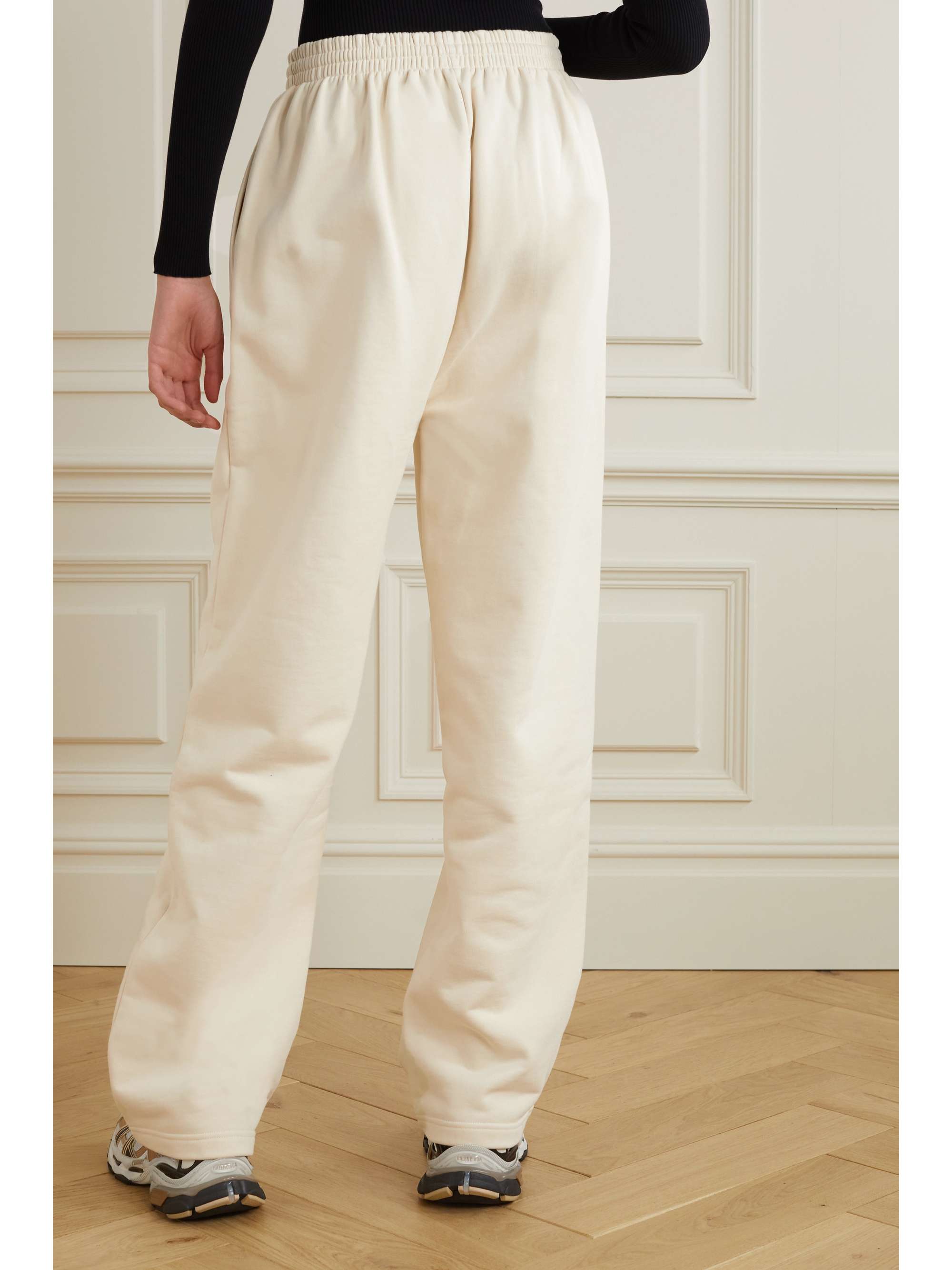 BALENCIAGA Distressed embroidered cotton-jersey track pants