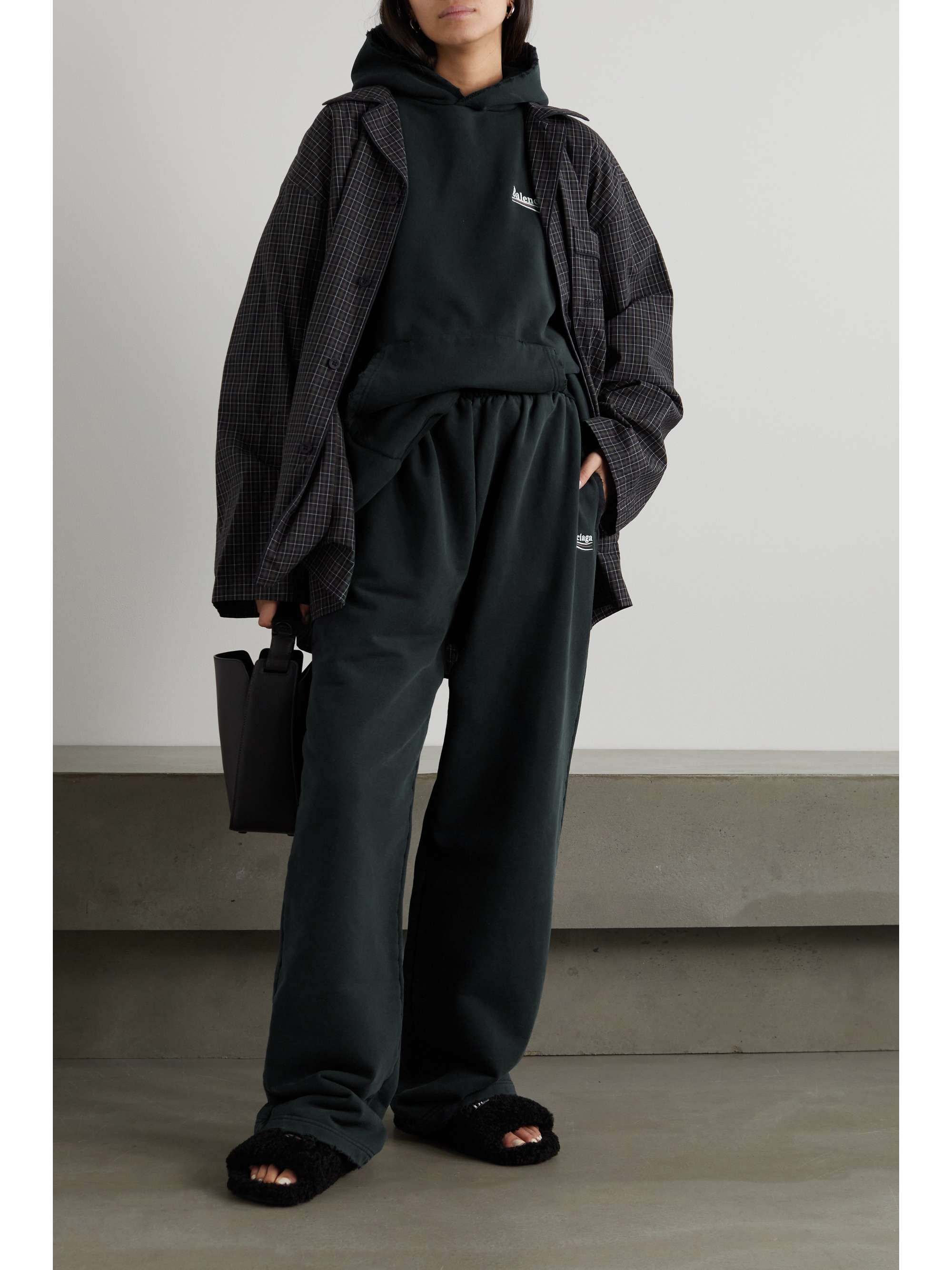 BALENCIAGA Distressed embroidered cotton-jersey track pants | NET-A-PORTER