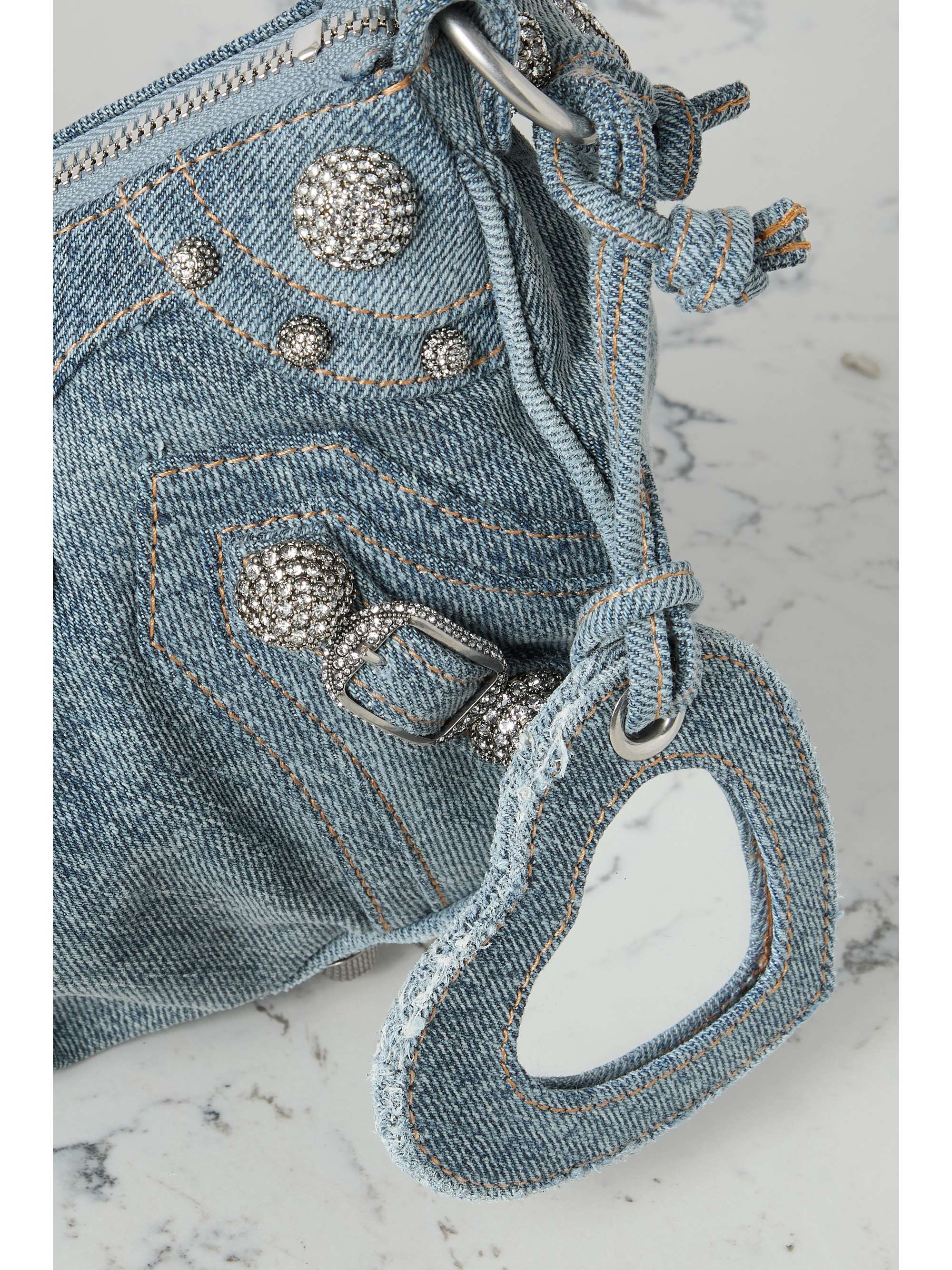 BALENCIAGA Le Cagole small embellished denim shoulder bag