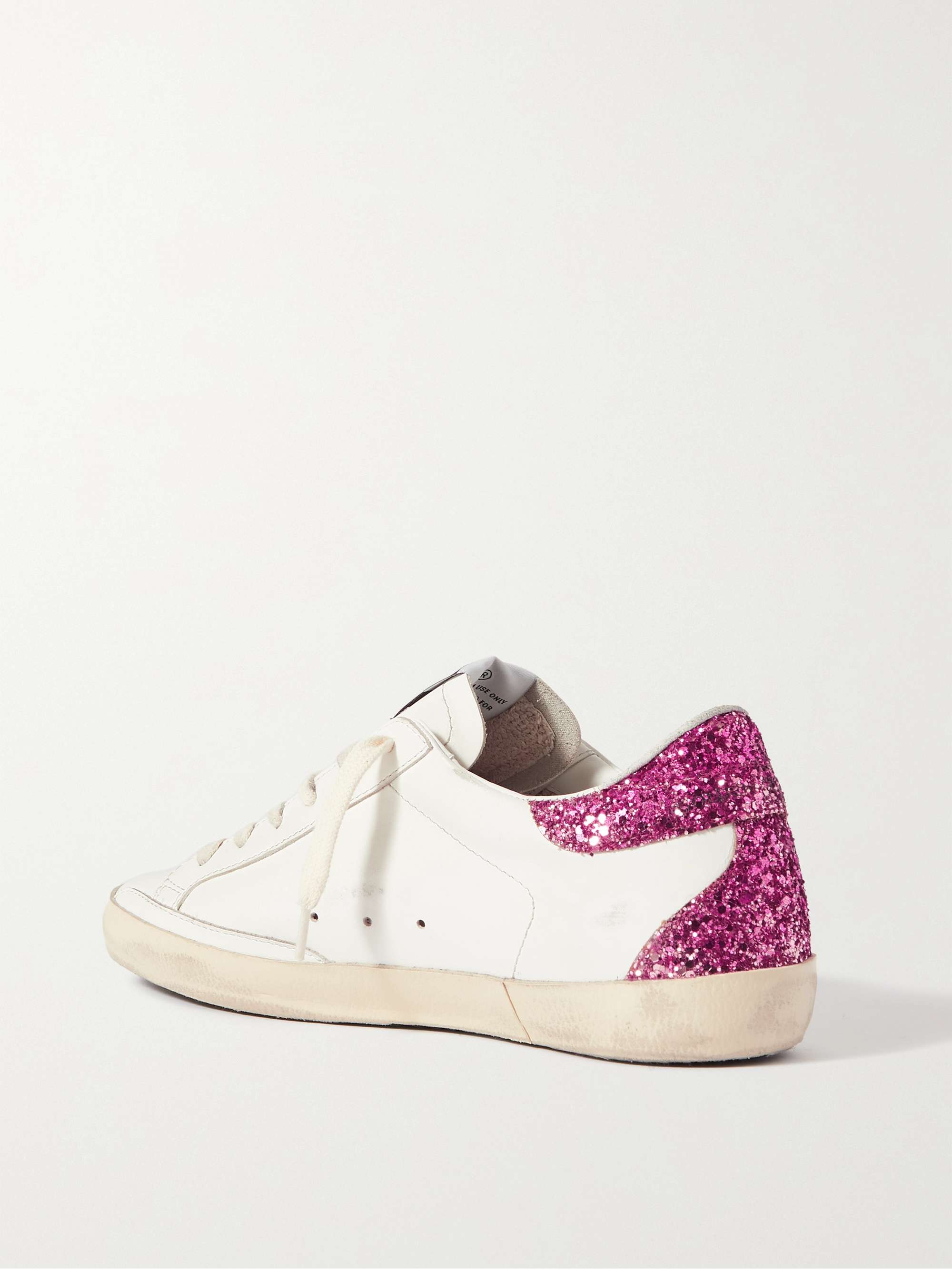 GOLDEN GOOSE Superstar distressed glittered leather sneakers