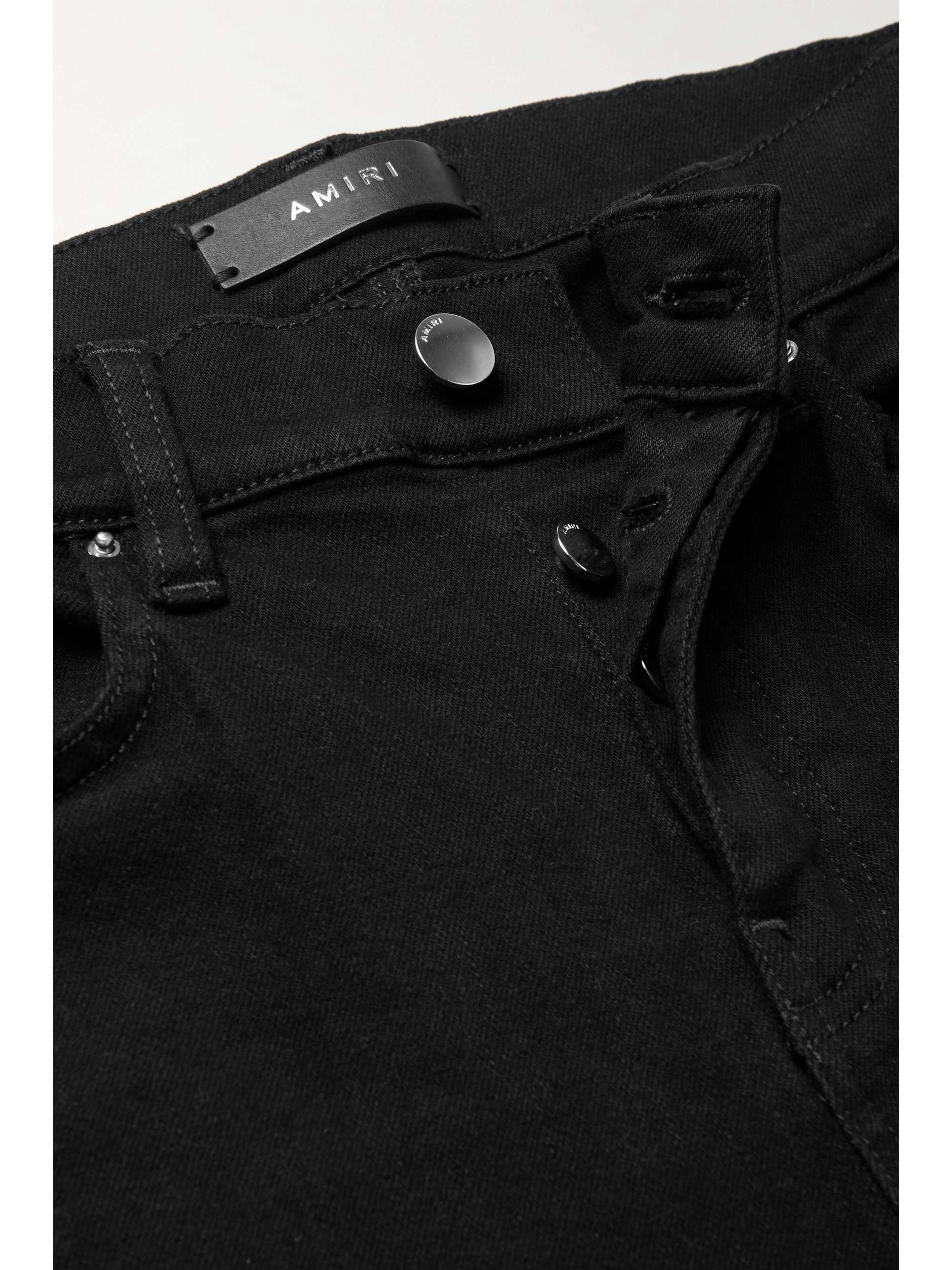 AMIRI MX1 leather-trimmed distressed high-rise slim-leg jeans