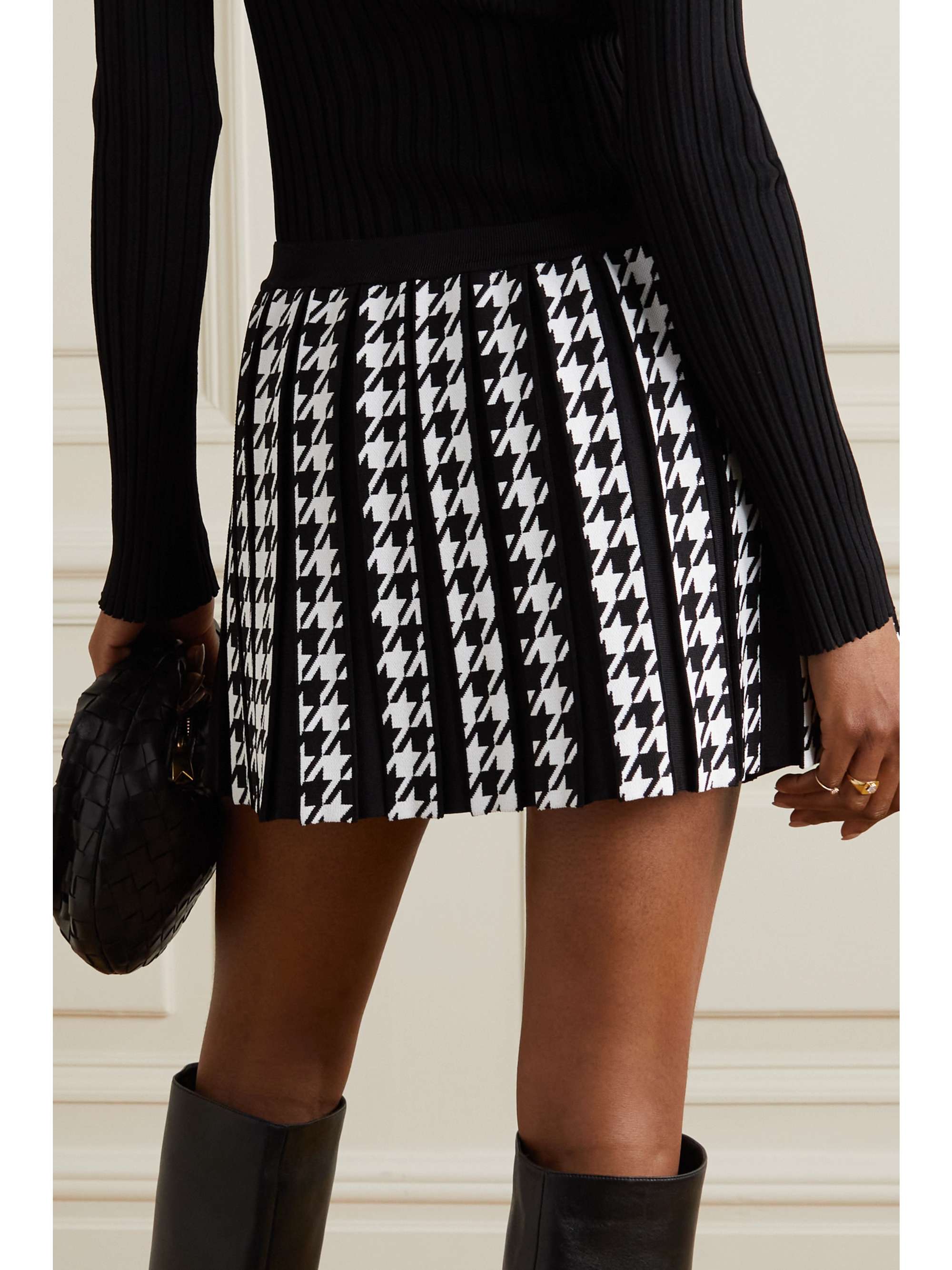 Button-embellished pleated houndstooth jacquard-knit mini skirt