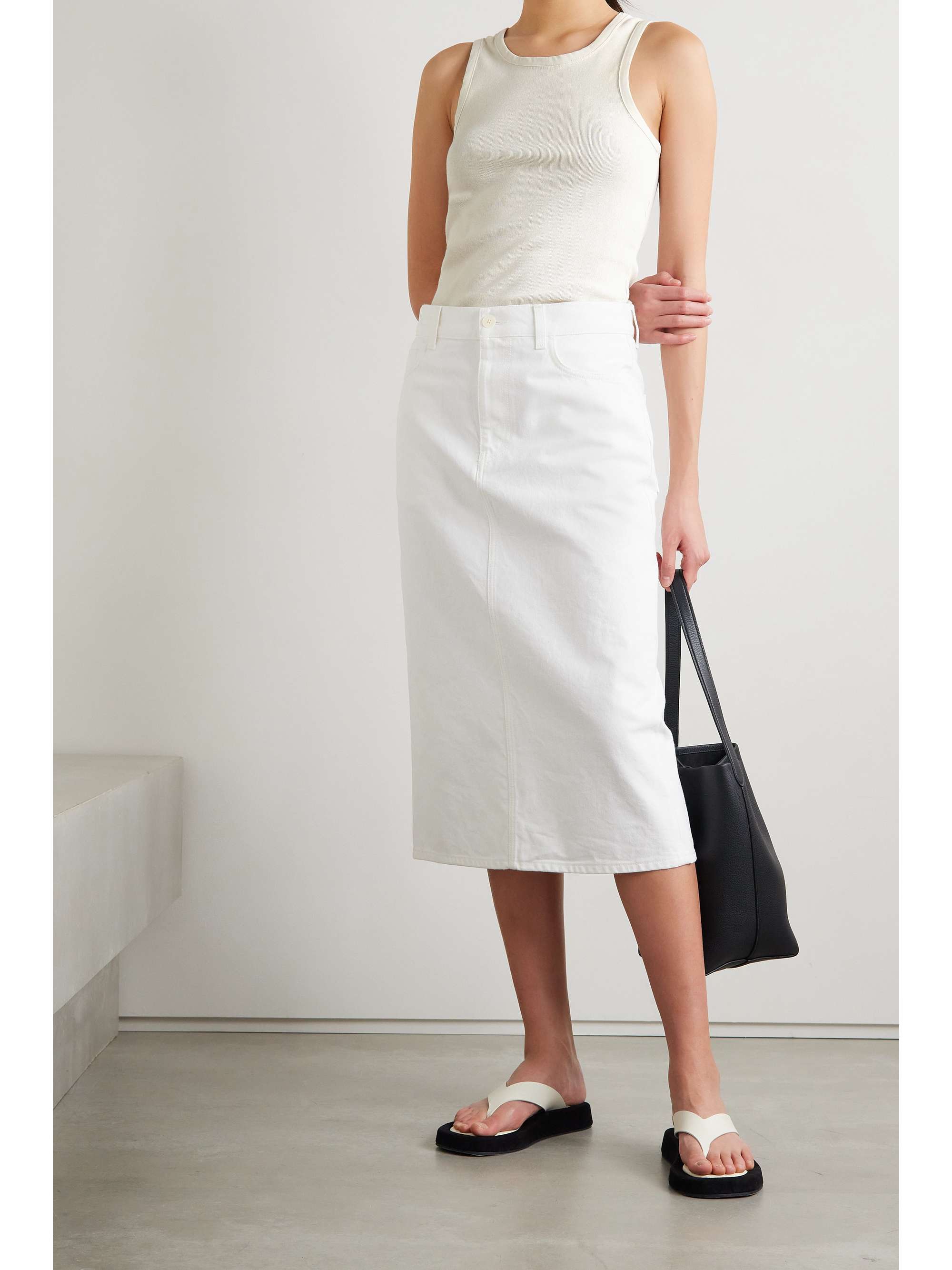 Premium long-lasting basics are The Row's specialty. This 'Glaura' tank is made from ribbed cotton-jersey in a versatile 'Dove White' shade, it's cut for a slim fit that's effortless to layer.