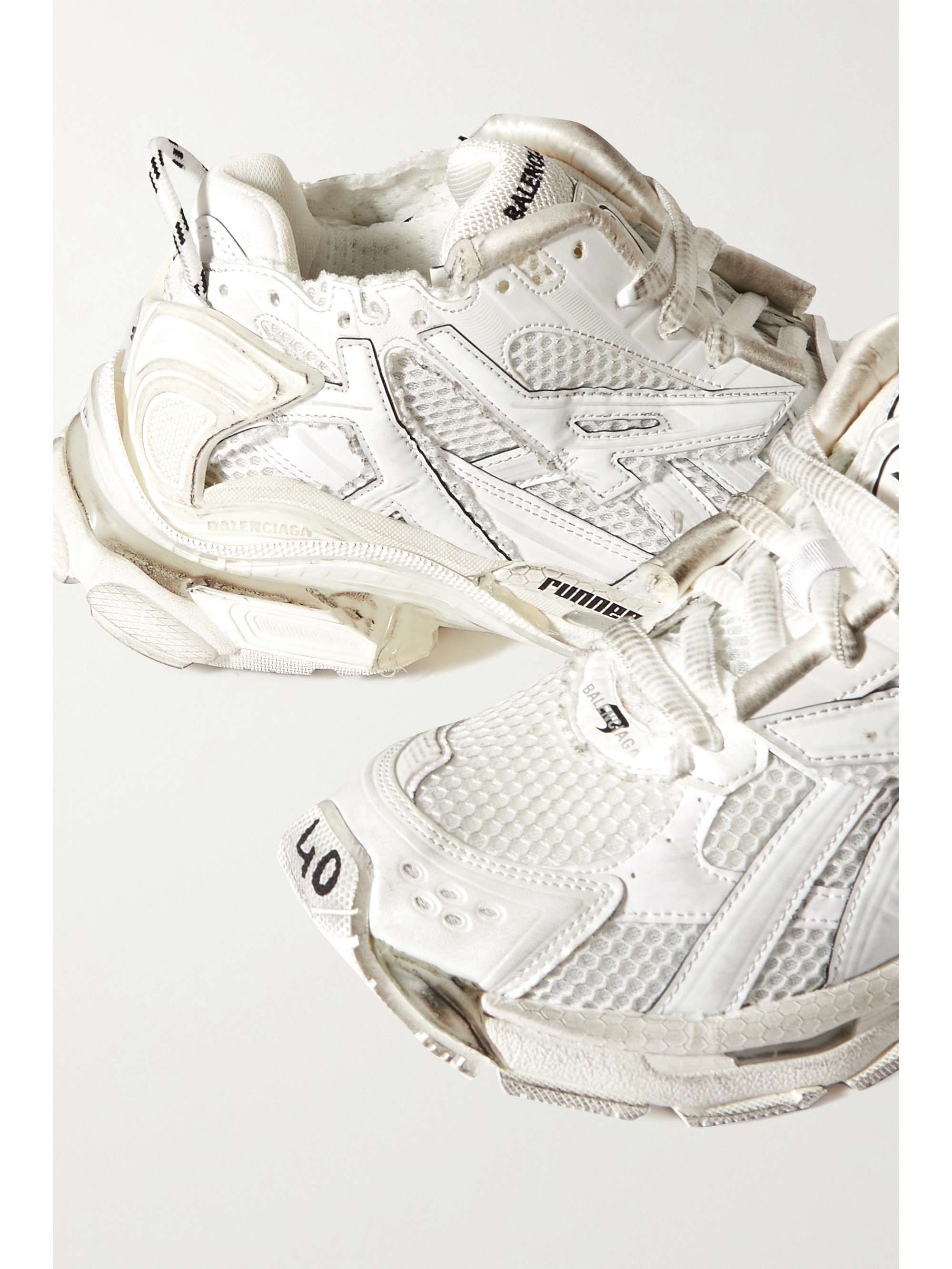 BALENCIAGA Runner logoembroidered leather and mesh sneakers NETAPORTER