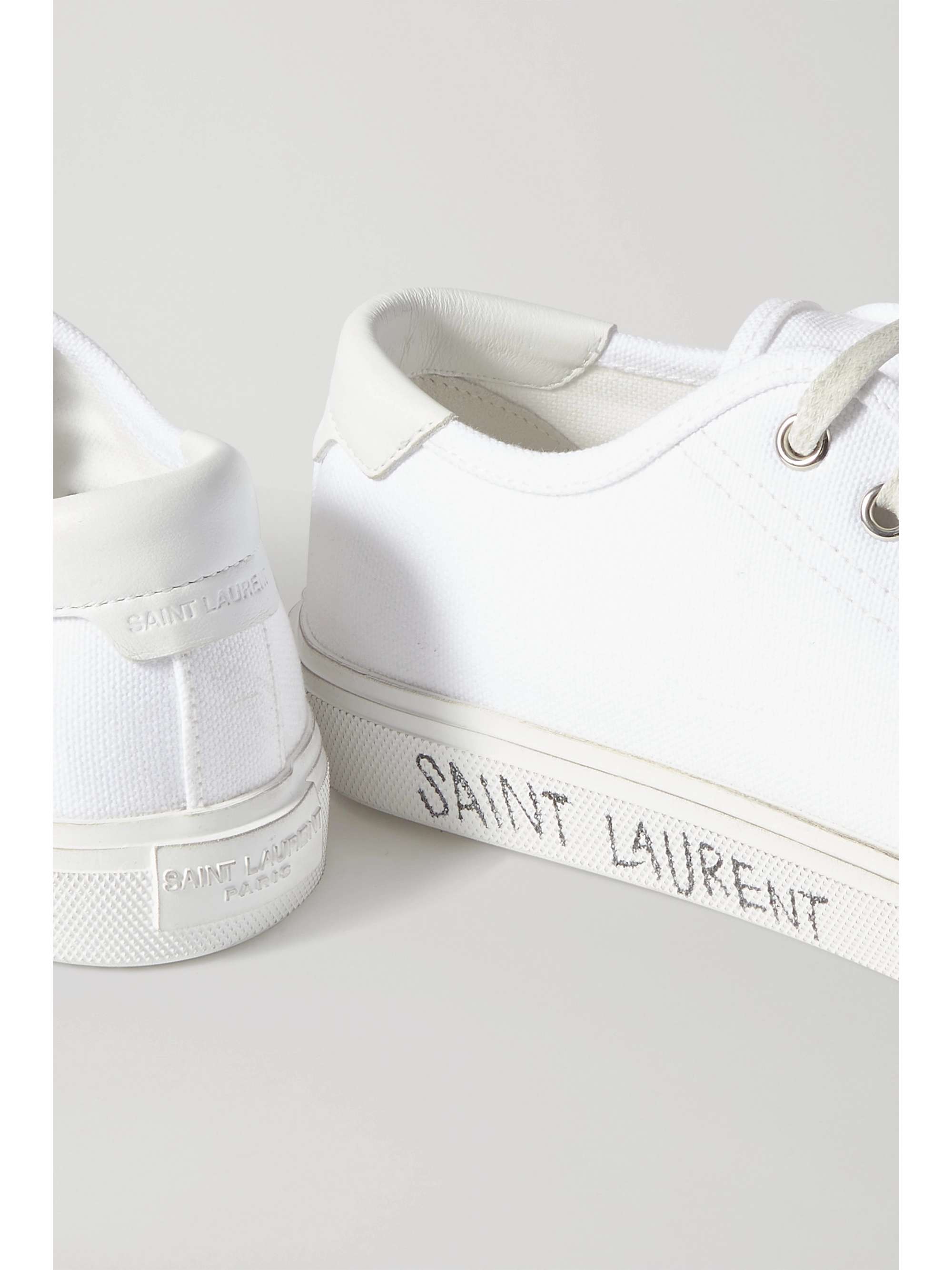 SAINT LAURENT Malibu distressed cotton-canvas sneakers | NET-A-PORTER