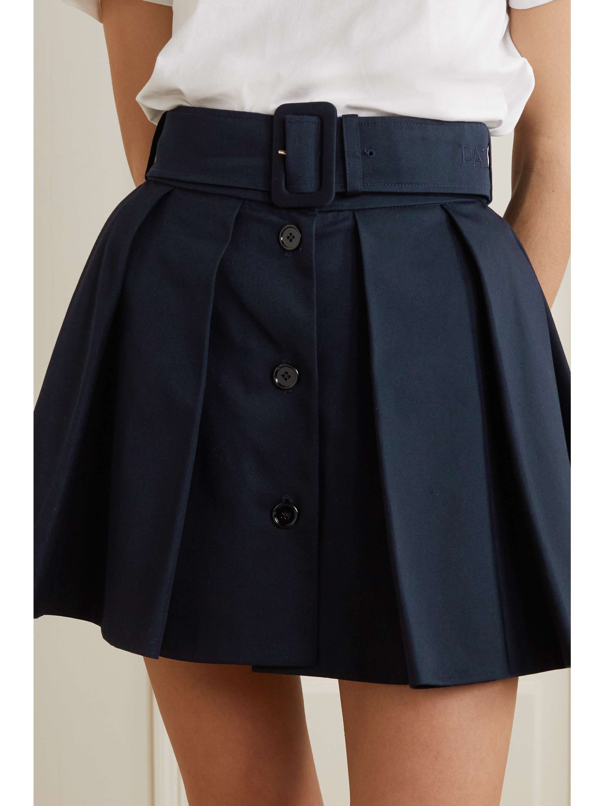 Navy Belted pleated cotton-twill mini skirt | PATOU | NET-A-PORTER