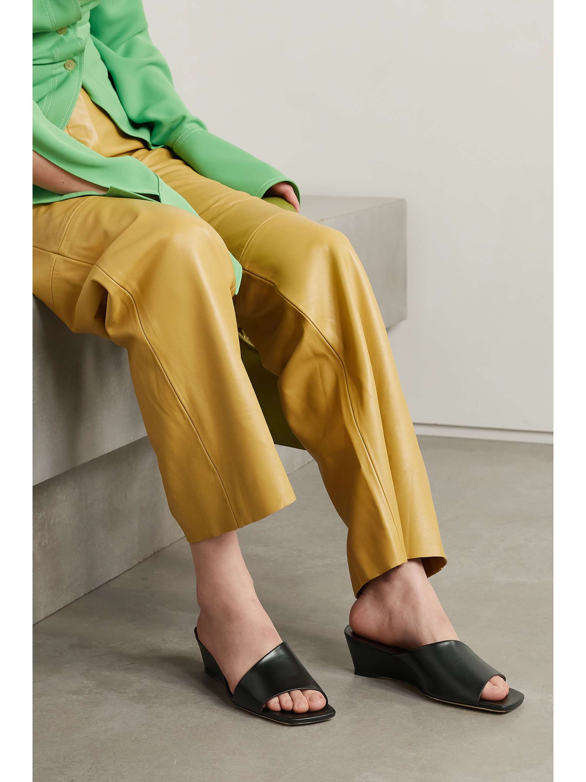 STAUD Nevil asymmetric leather wedge mules