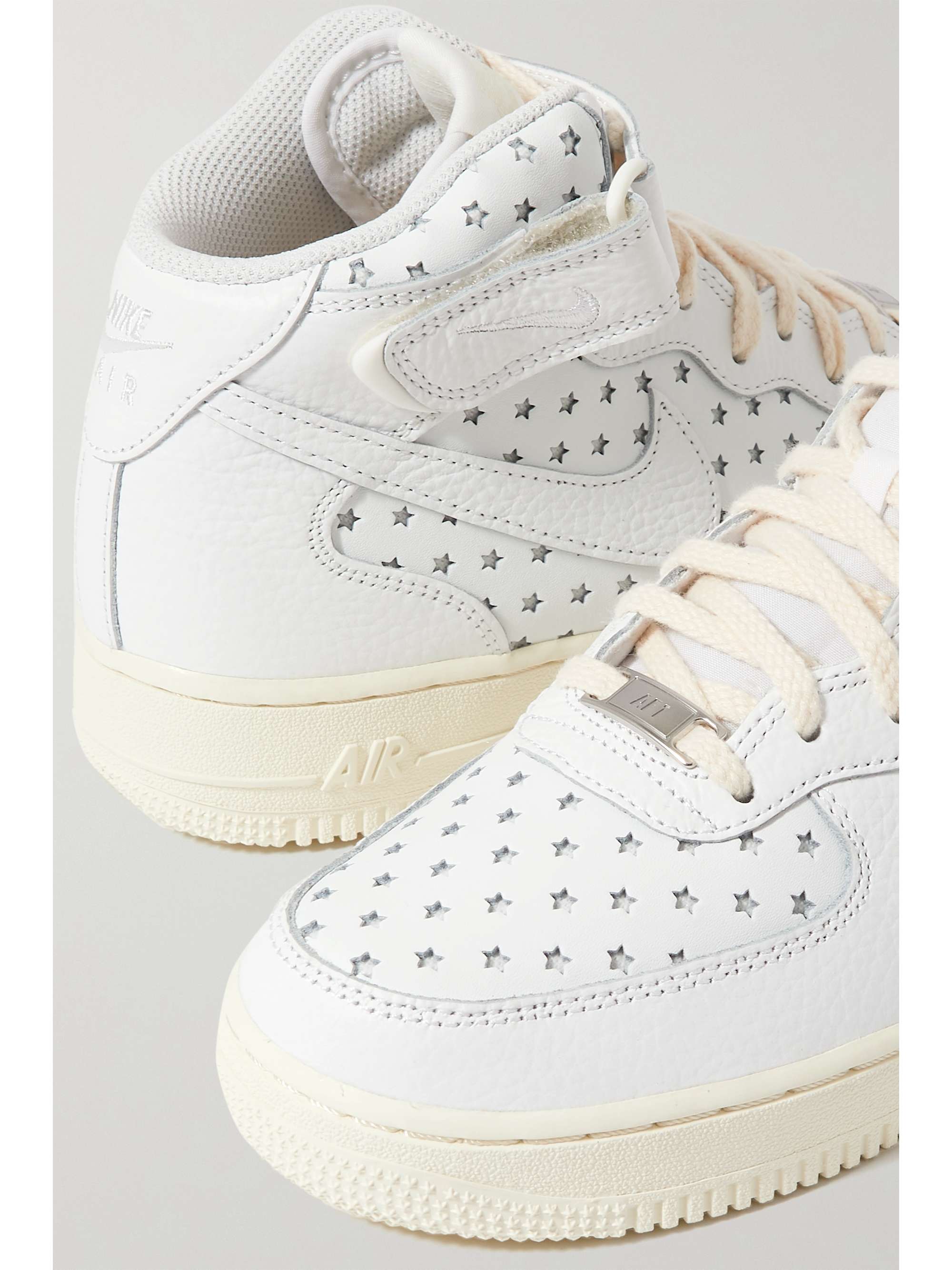 Nike Air Force 1 Mid Star-embossed Leather Mid-top Trainers in