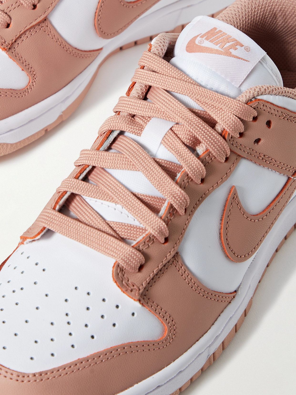 Shop Nike Dunk Low Leather Sneakers In Pink