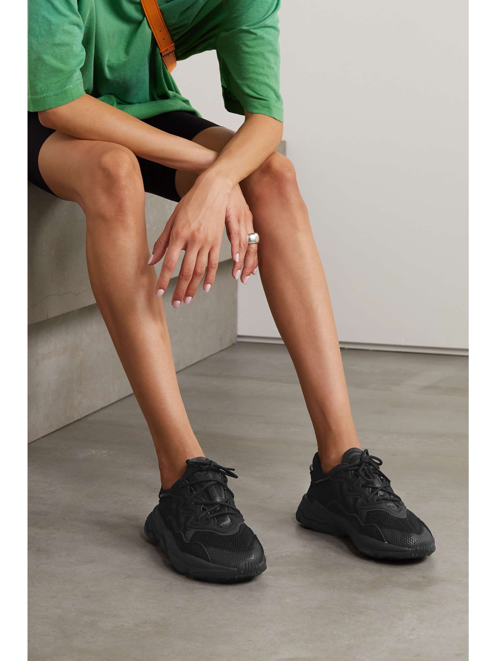 Black Ozweego faux leather-trimmed mesh sneakers | ORIGINALS | NET-A-PORTER