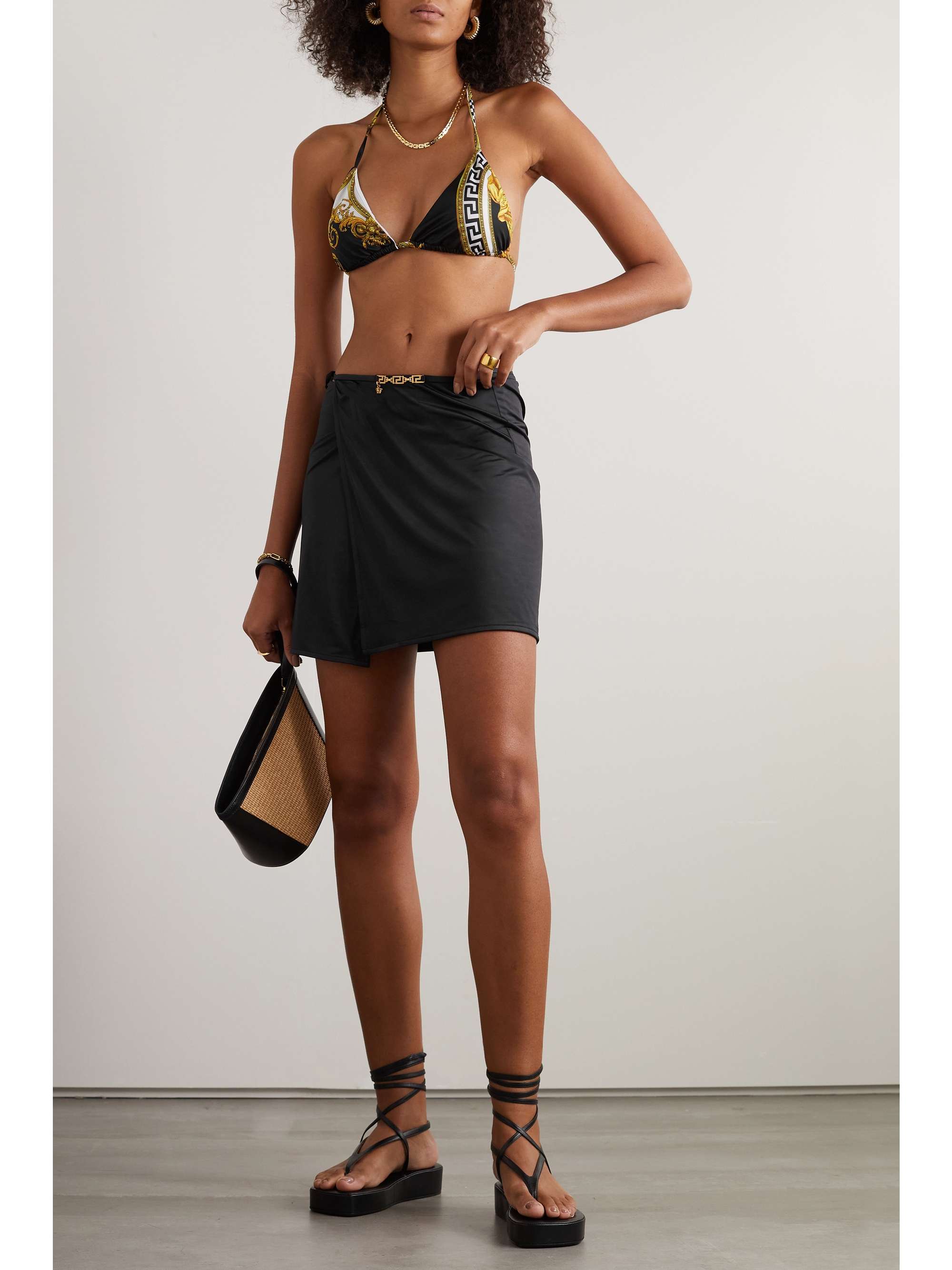 VERSACE Embellished stretch mini wrap skirt