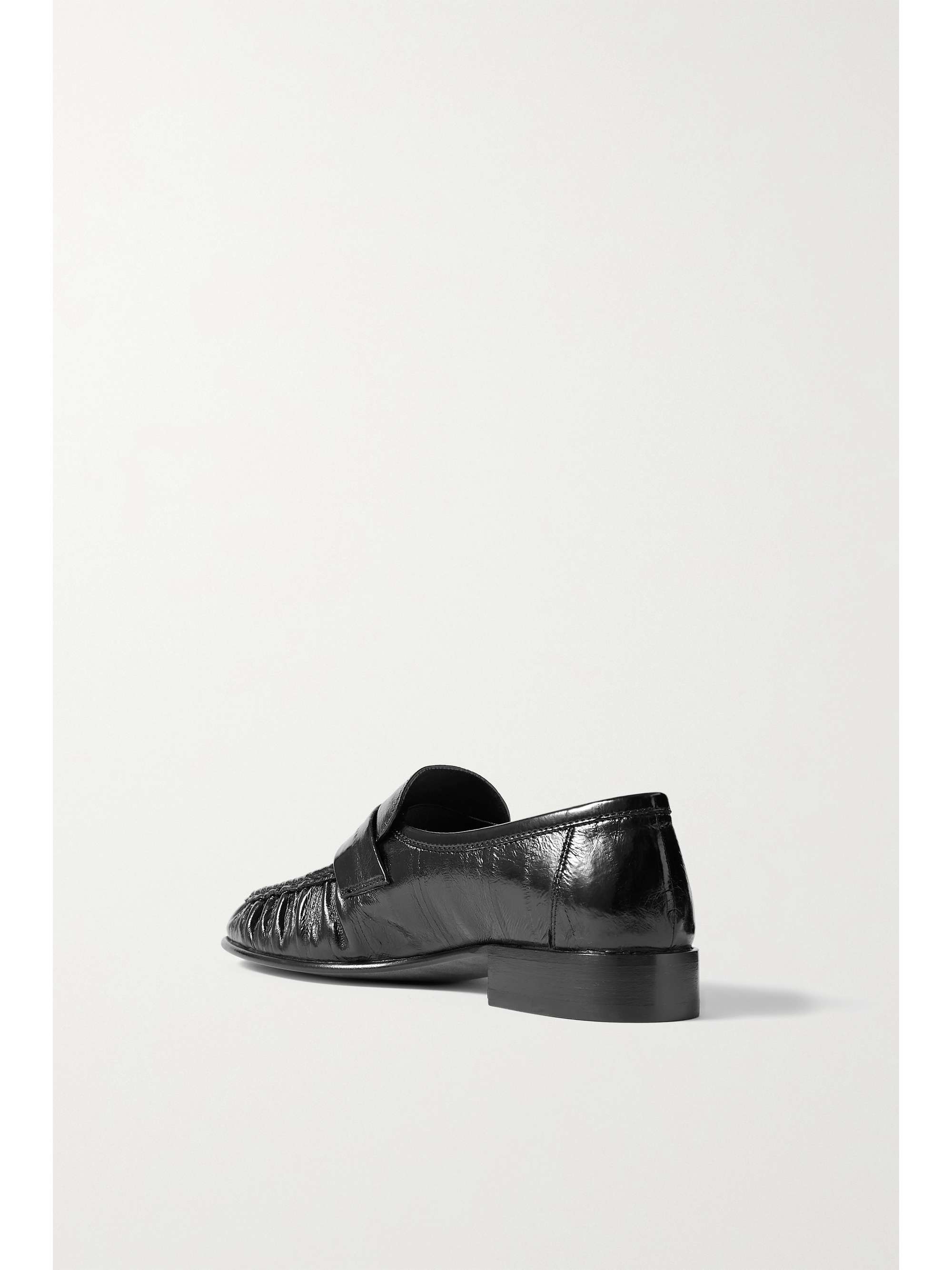 THE ROW Crinkled glossed-leather loafers