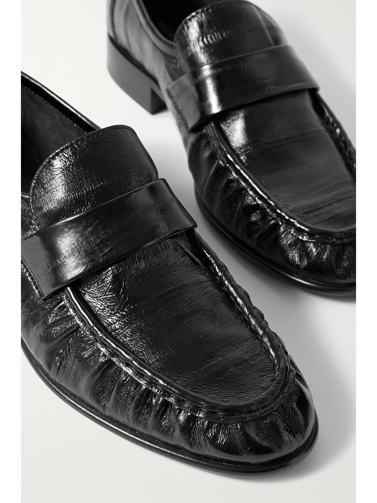 Shop The Row Eel Crinkled Glossed-leather Loafers In Black