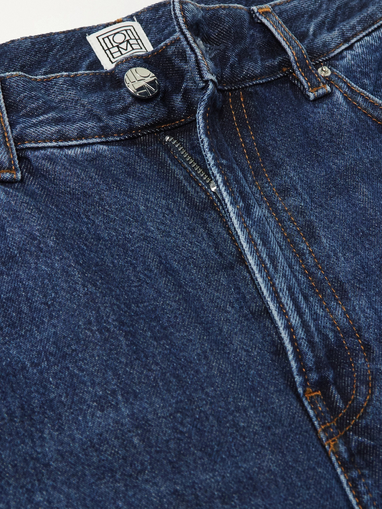 Shop Totême + Net Sustain High-rise Tapered Organic Jeans In Blue