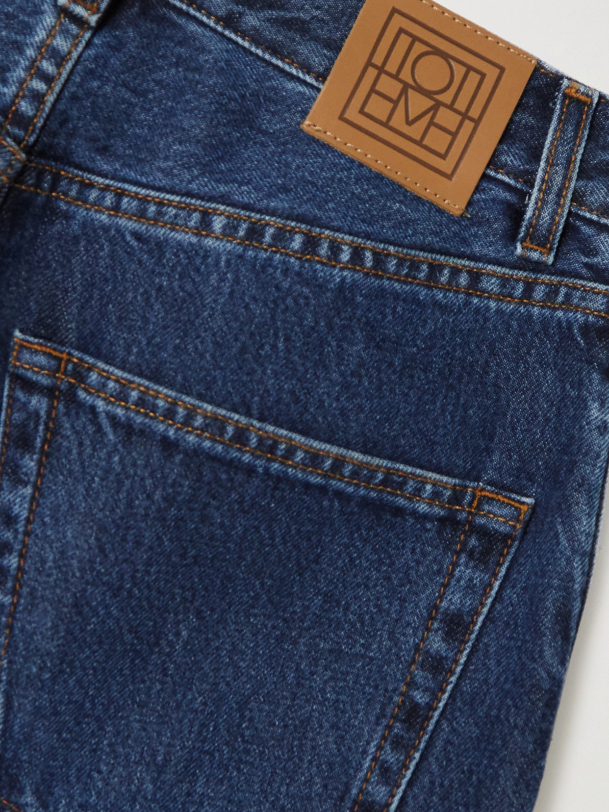 Shop Totême + Net Sustain High-rise Tapered Organic Jeans In Blue