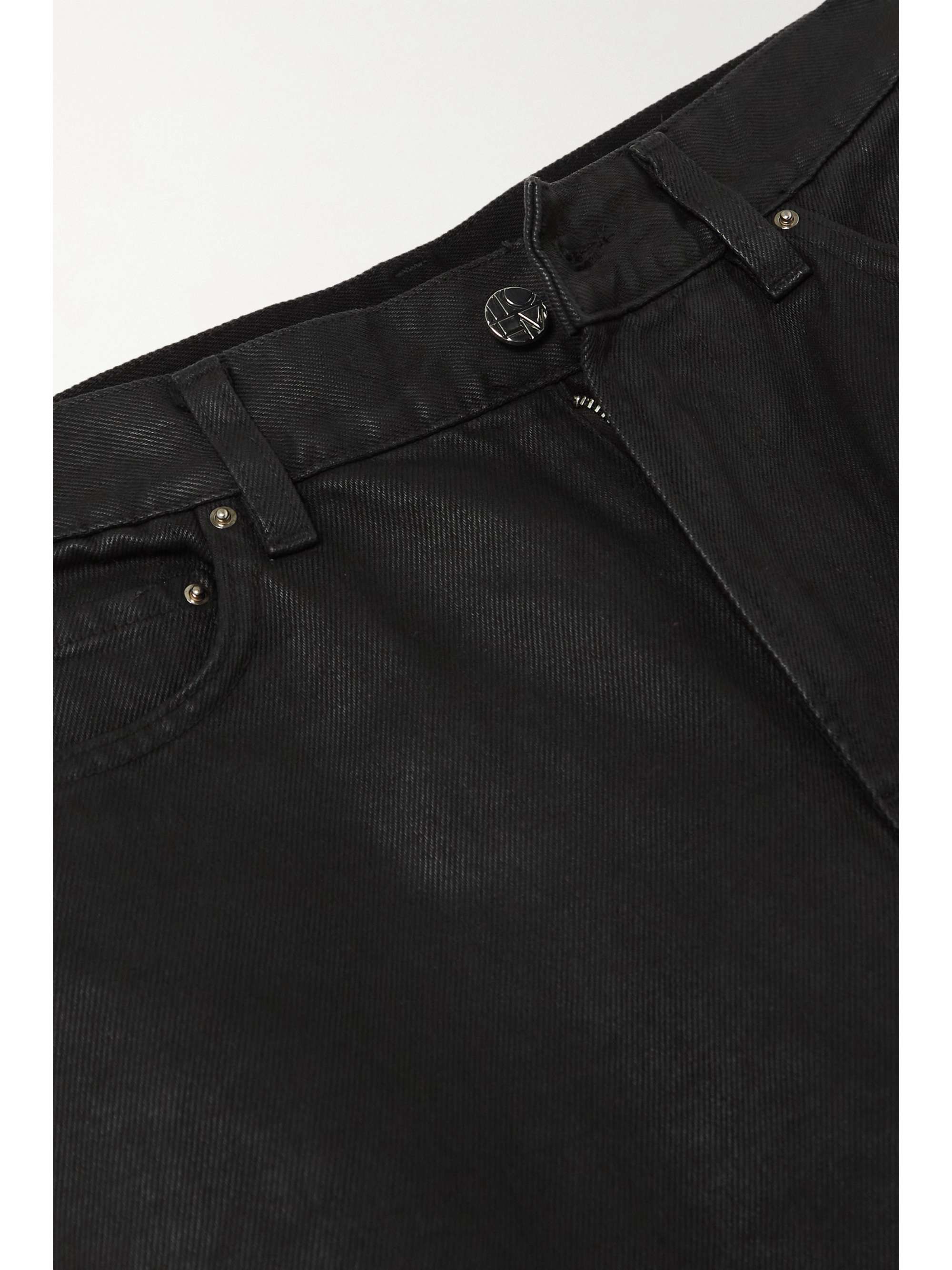 TOTEME Coated high-rise tapered jeans